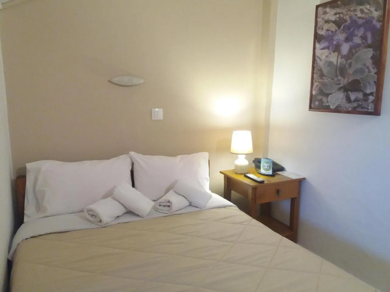 Bed in Olympus View Rooms Sauna & Spa