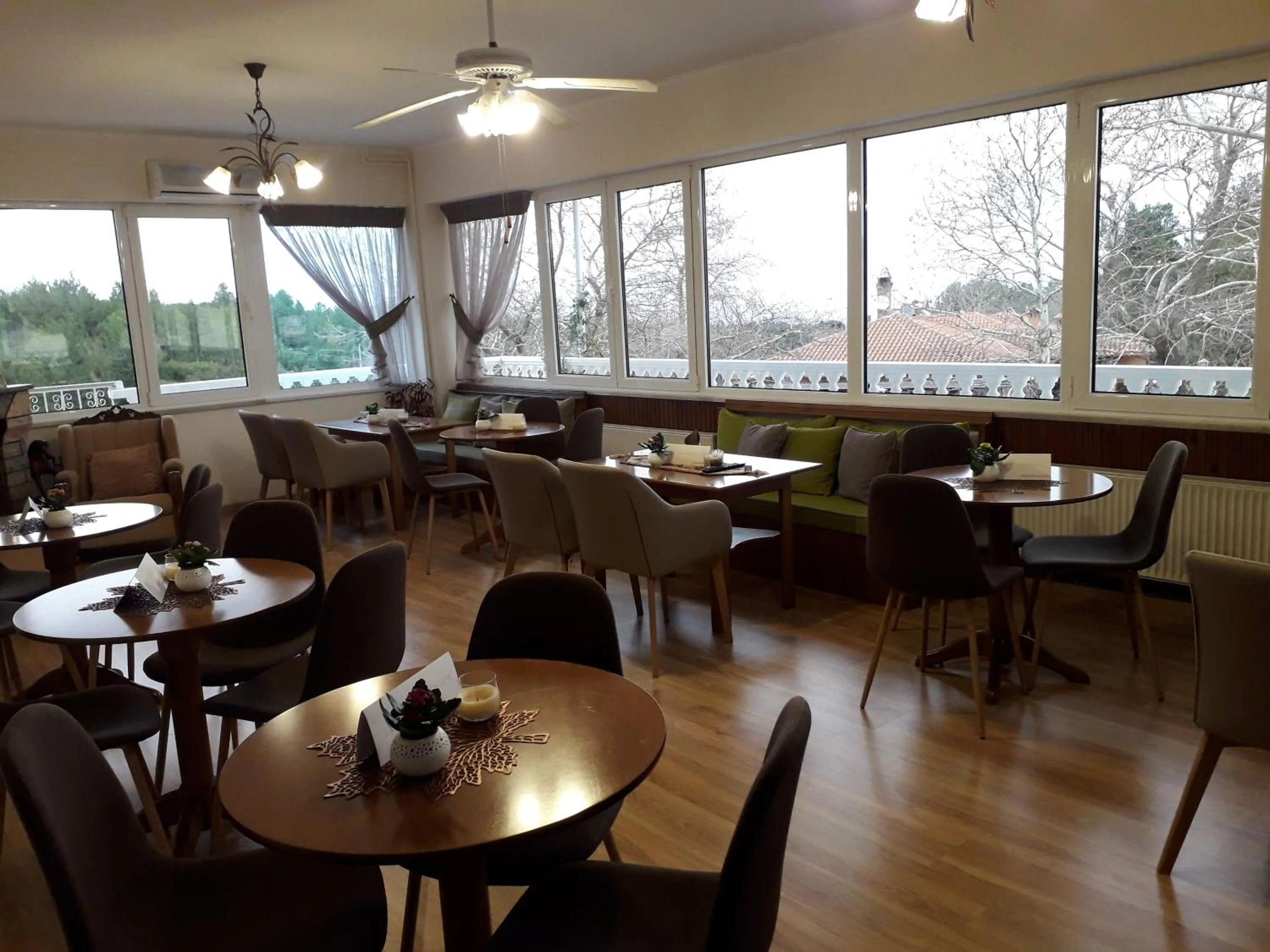 Communal lounge/ TV room in Olympus View Rooms Sauna & Spa