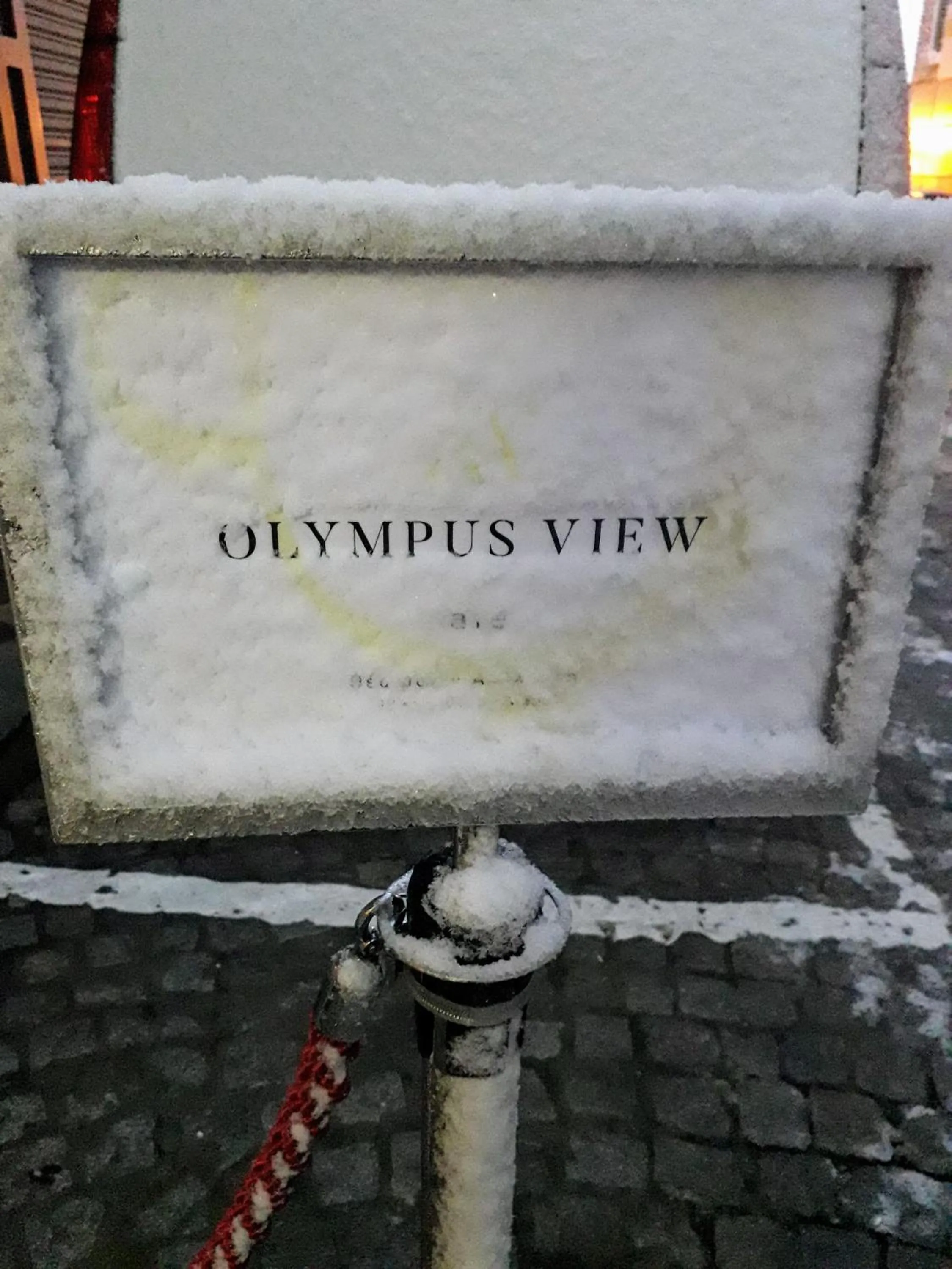 Property logo or sign in Olympus View Rooms Sauna & Spa