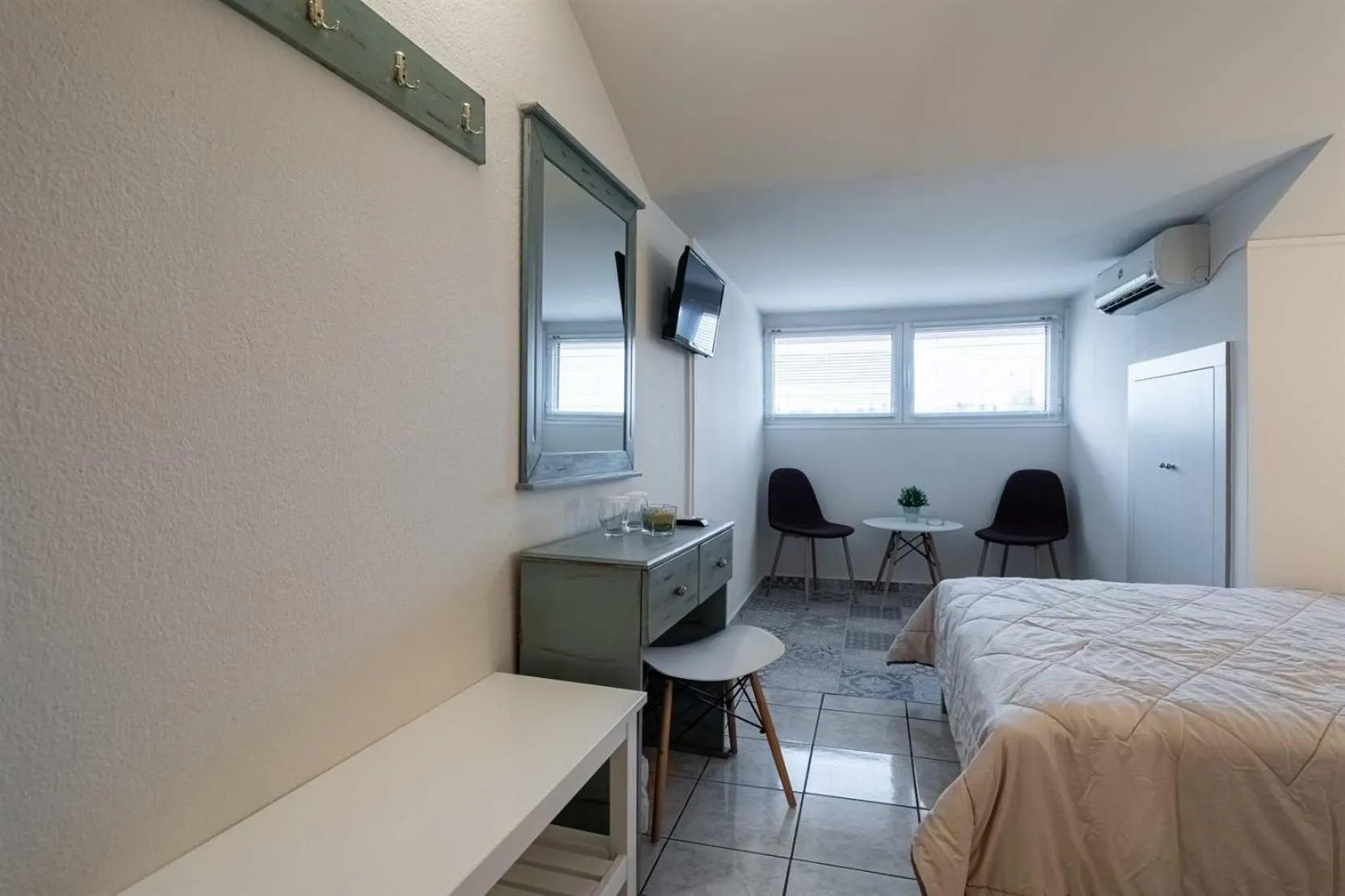 Bed in Olympus View Rooms Sauna & Spa