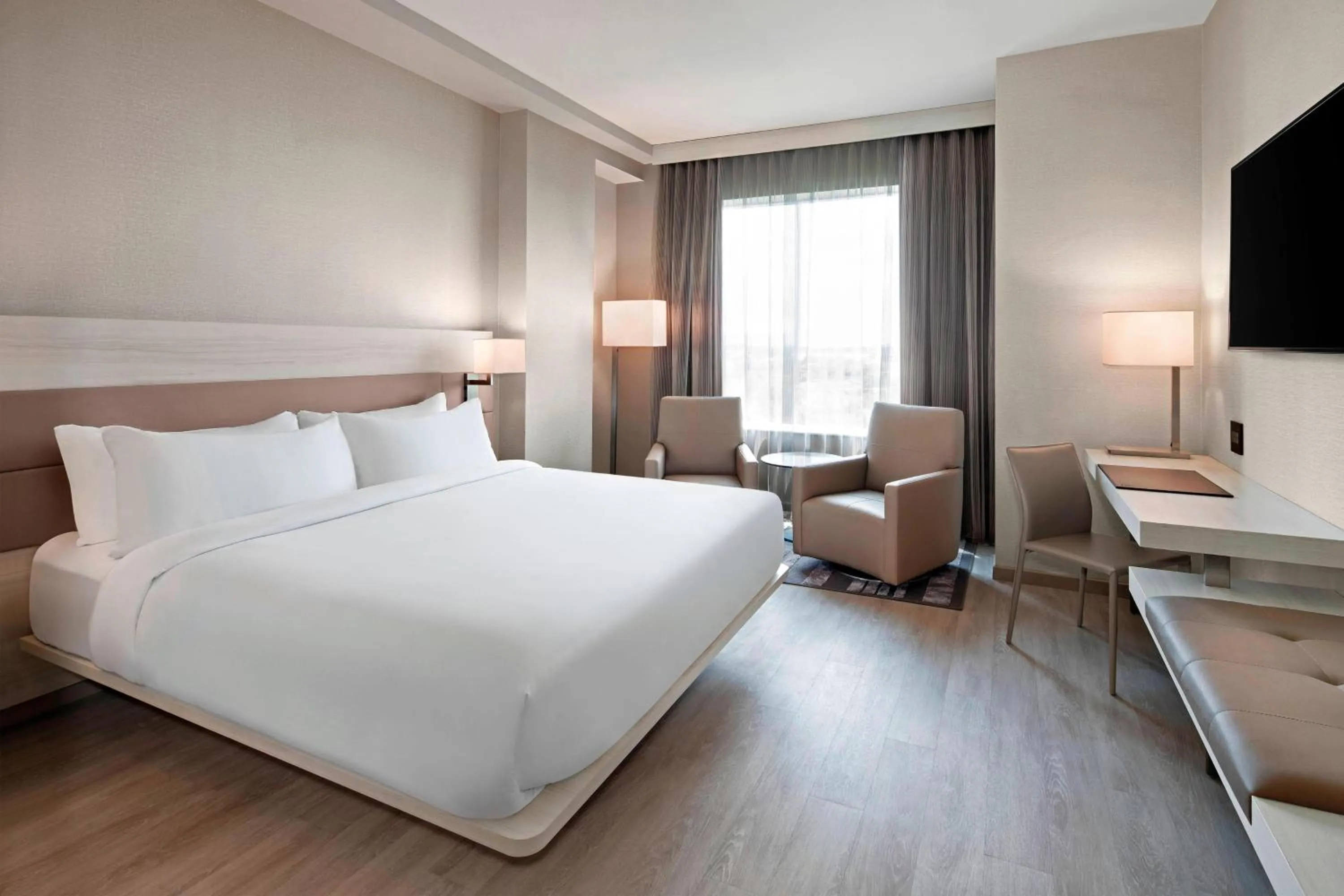 Photo of the whole room, Bed in AC Hotel by Marriott Gainesville Downtown