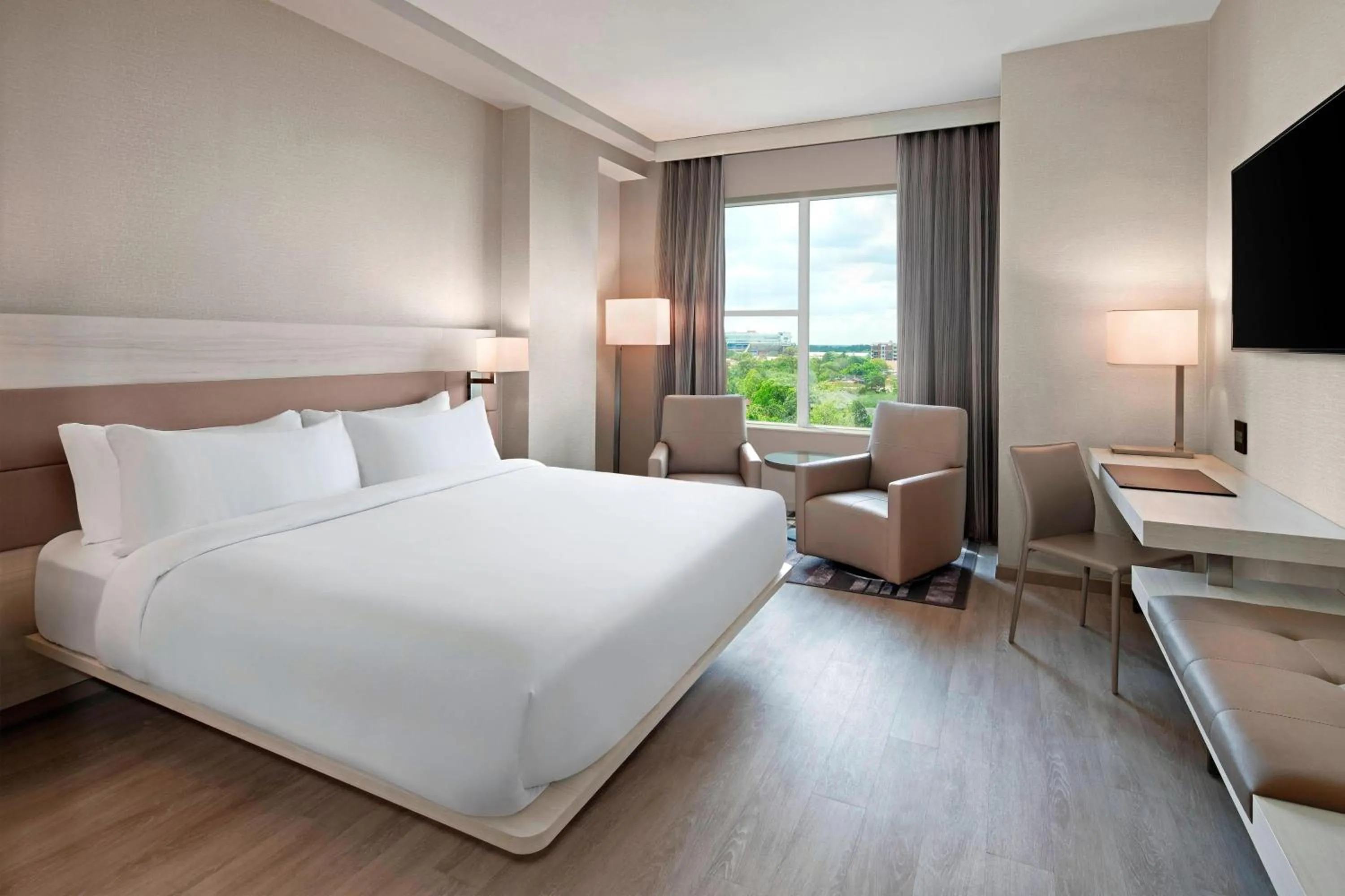 Photo of the whole room, Bed in AC Hotel by Marriott Gainesville Downtown