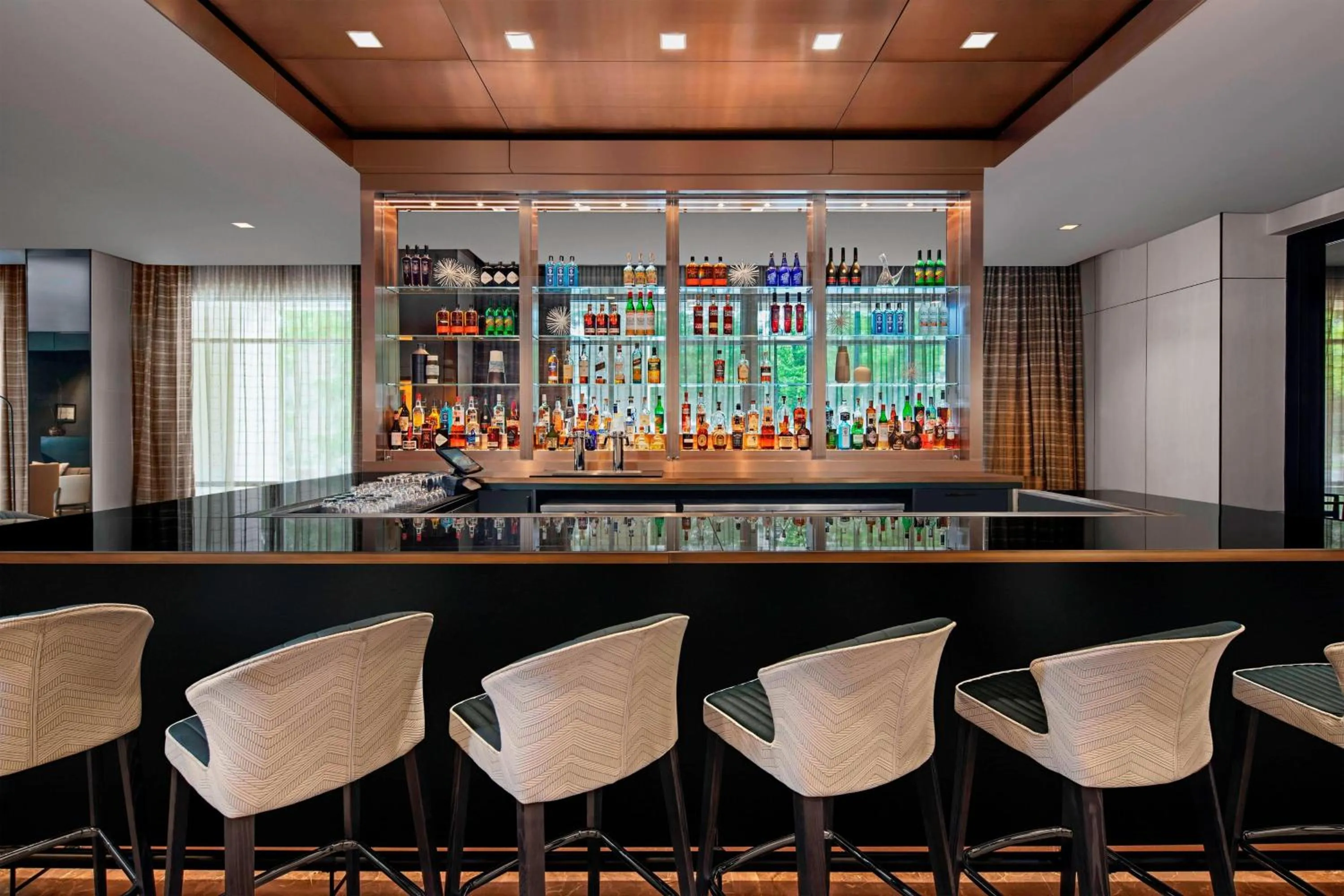Lounge or bar in AC Hotel by Marriott Gainesville Downtown