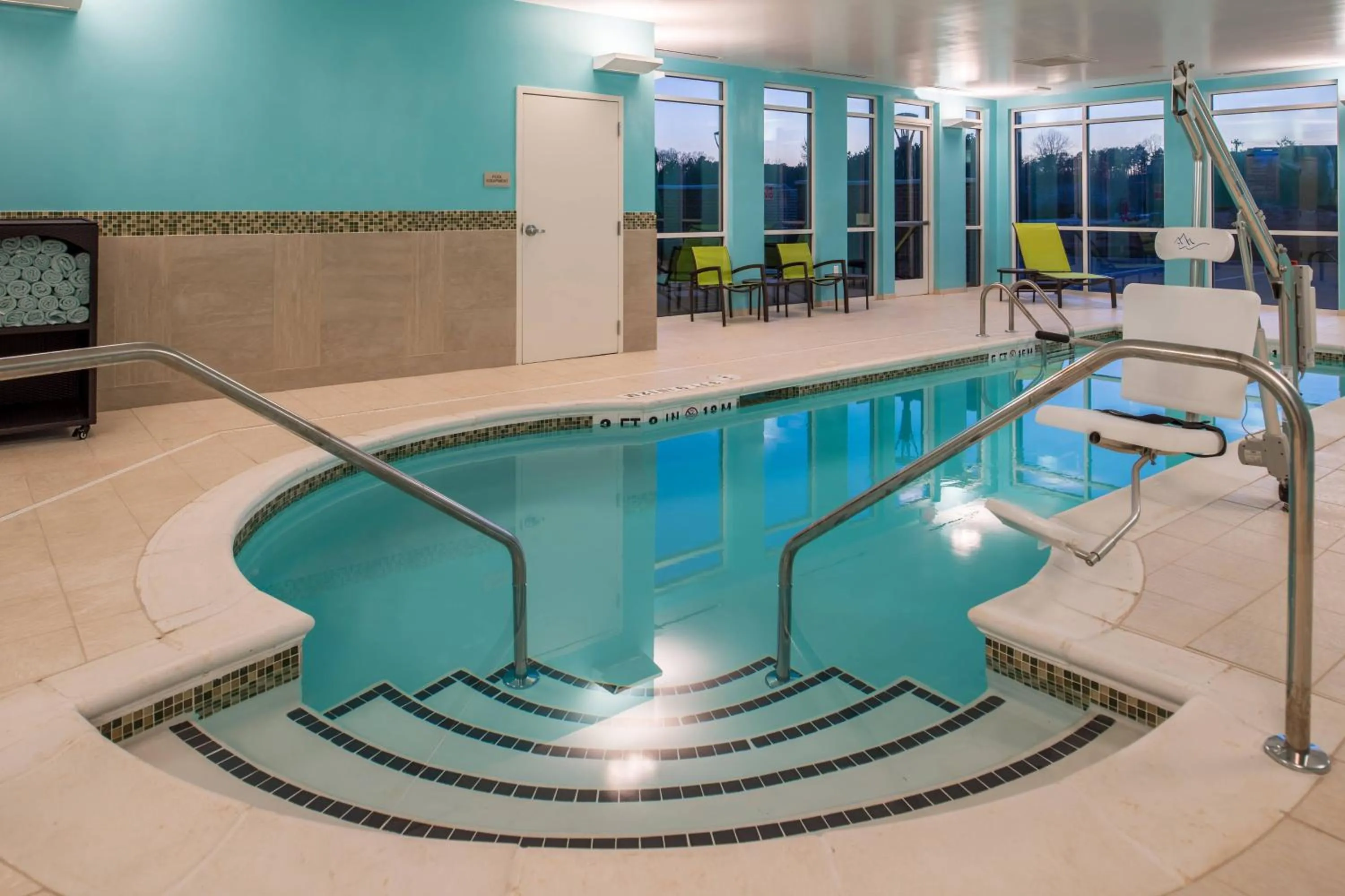 Swimming pool in SpringHill Suites by Marriott Greensboro Airport
