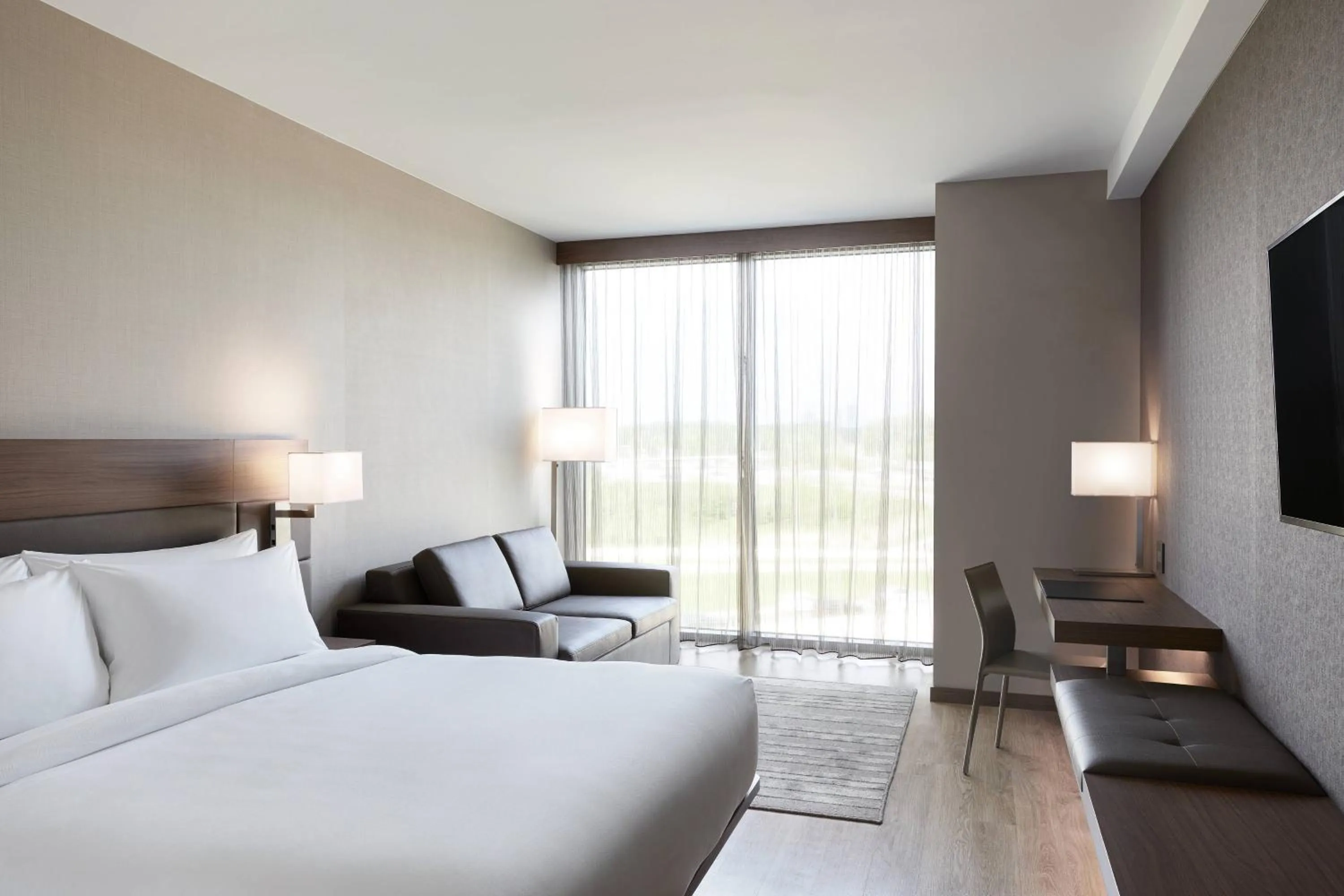 Photo of the whole room, Bed in AC Hotel by Marriott Minneapolis West End