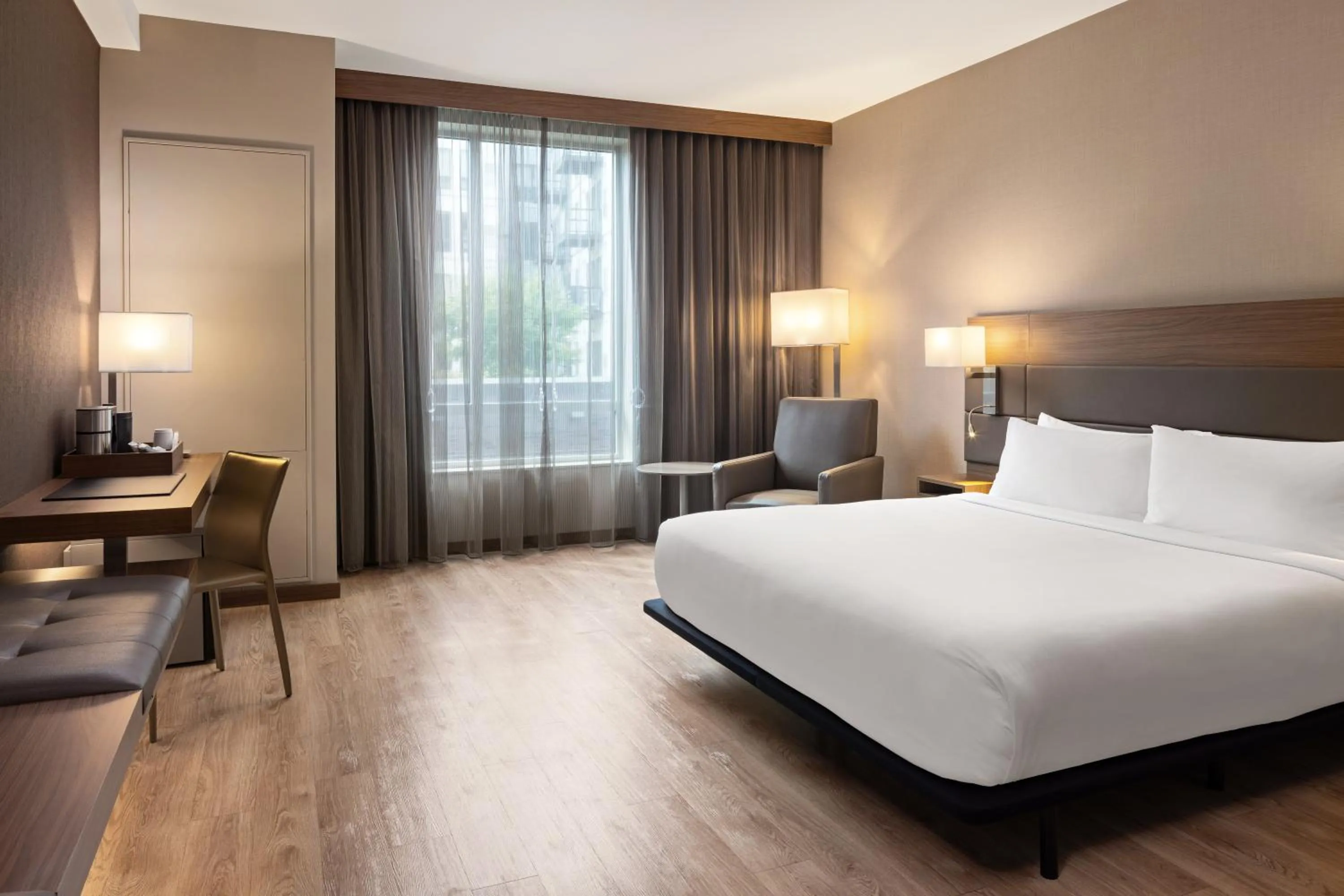 Seating area, Bed in AC Hotel by Marriott Minneapolis West End