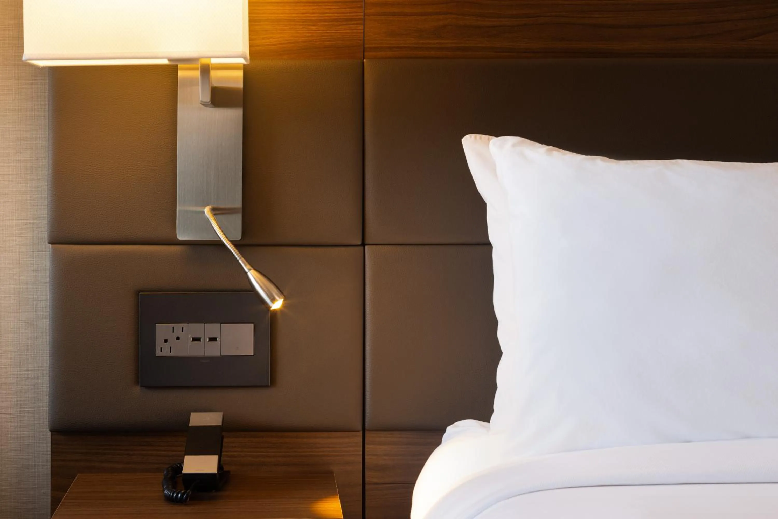 Bed in AC Hotel by Marriott Minneapolis West End