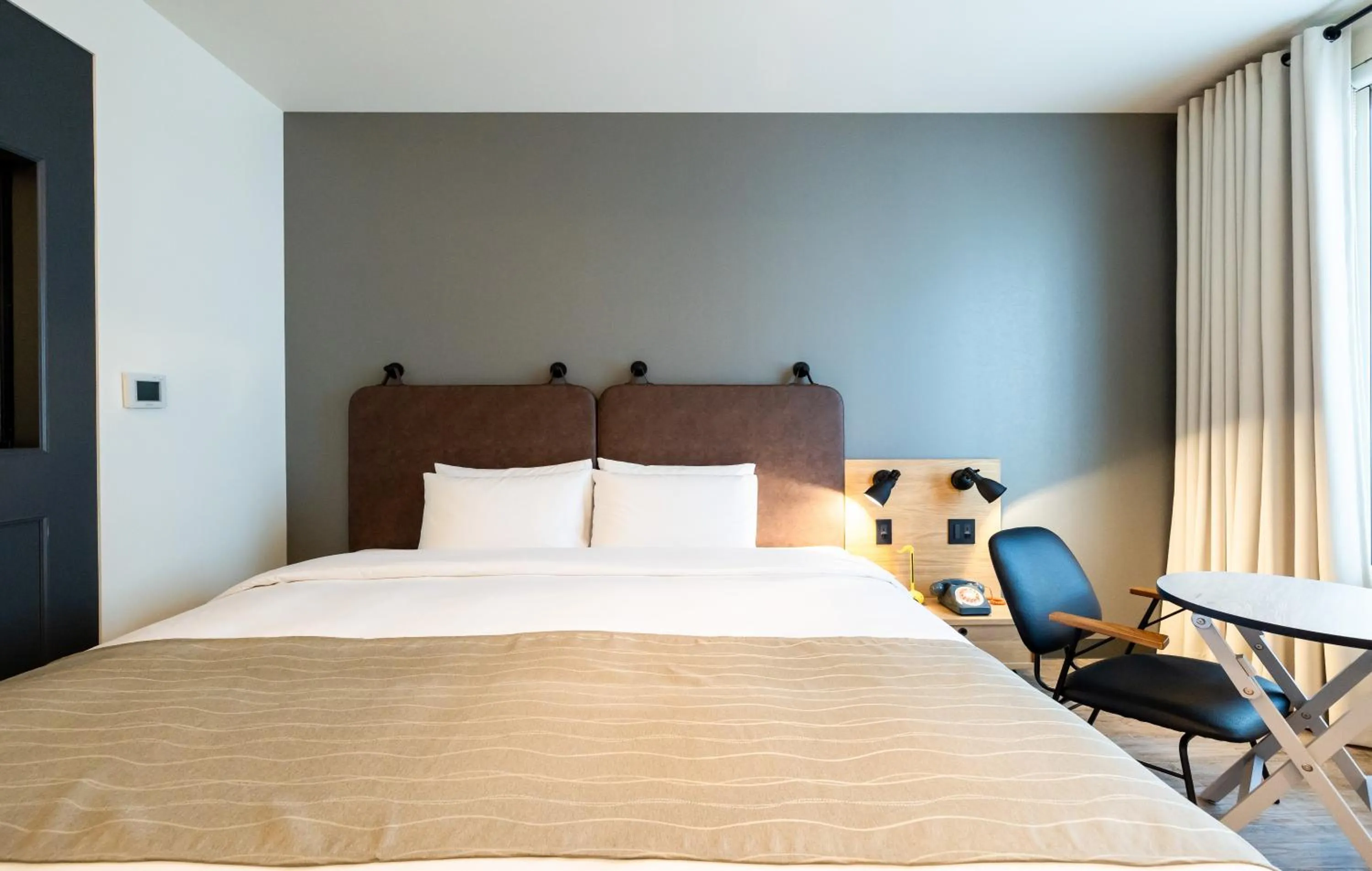 View (from property/room), Bed in MOXY Osaka Honmachi