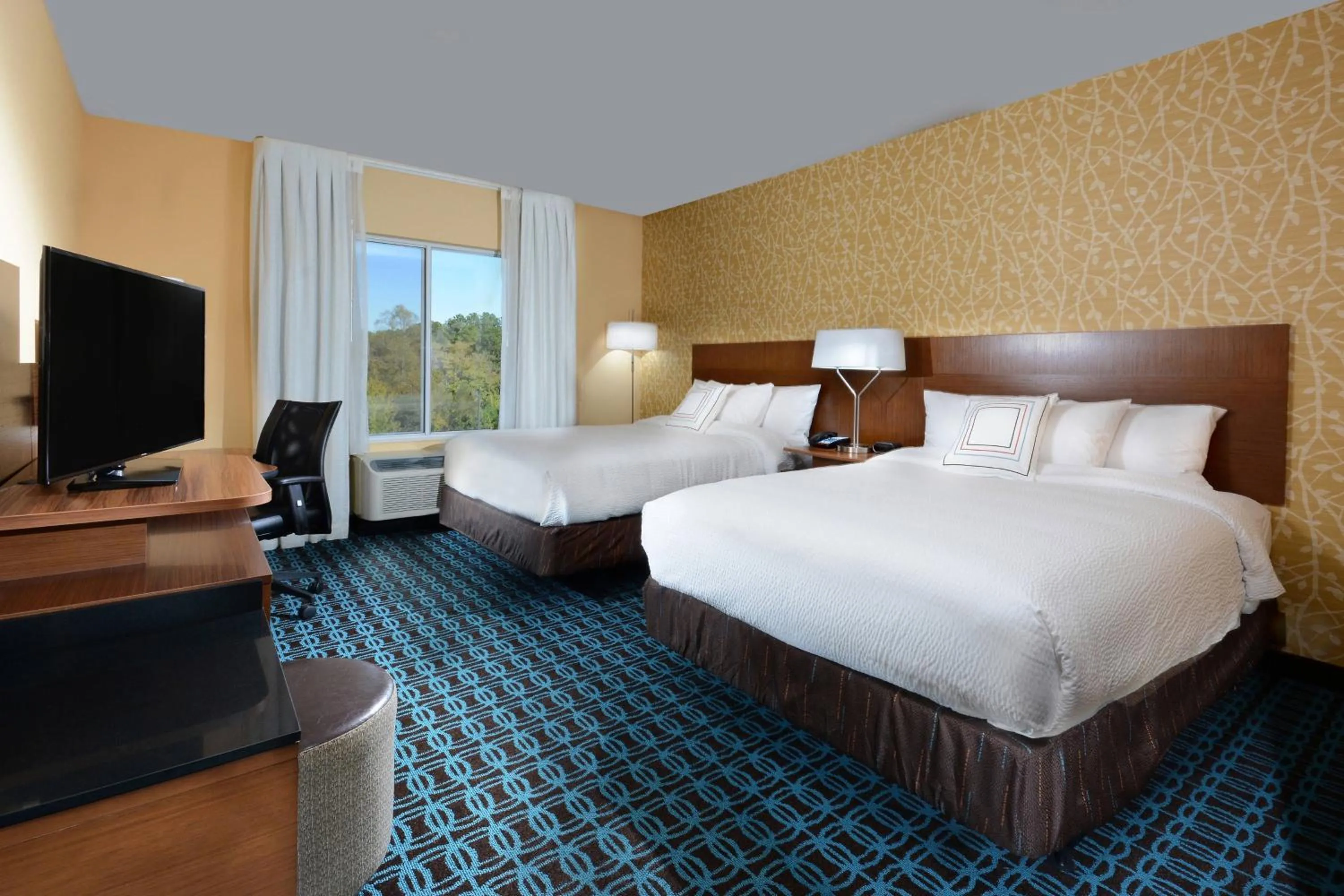 Photo of the whole room, Bed in Fairfield Inn & Suites by Marriott Raleigh Capital Blvd./I-540