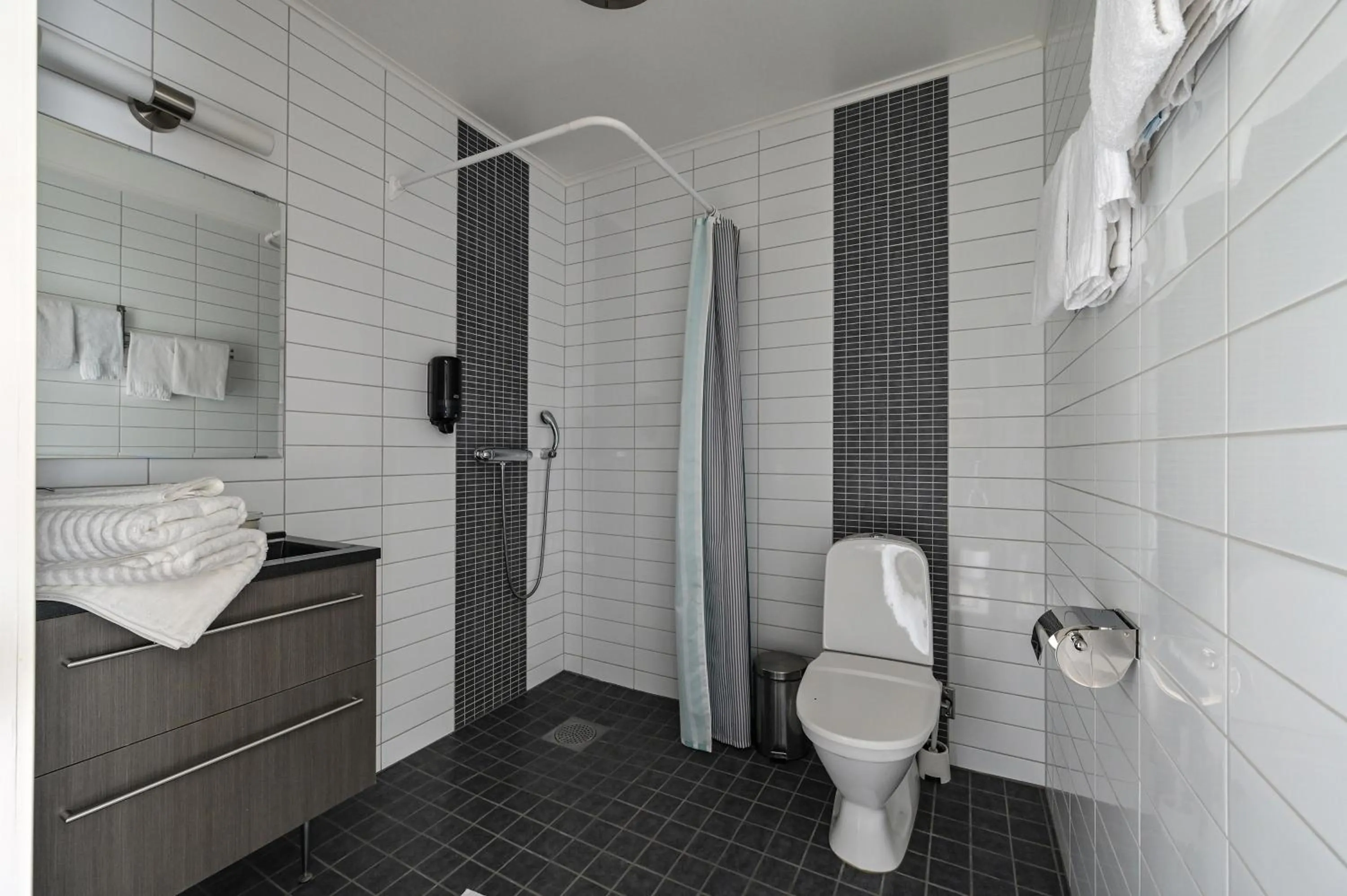 Shower in EttSmart Hotell