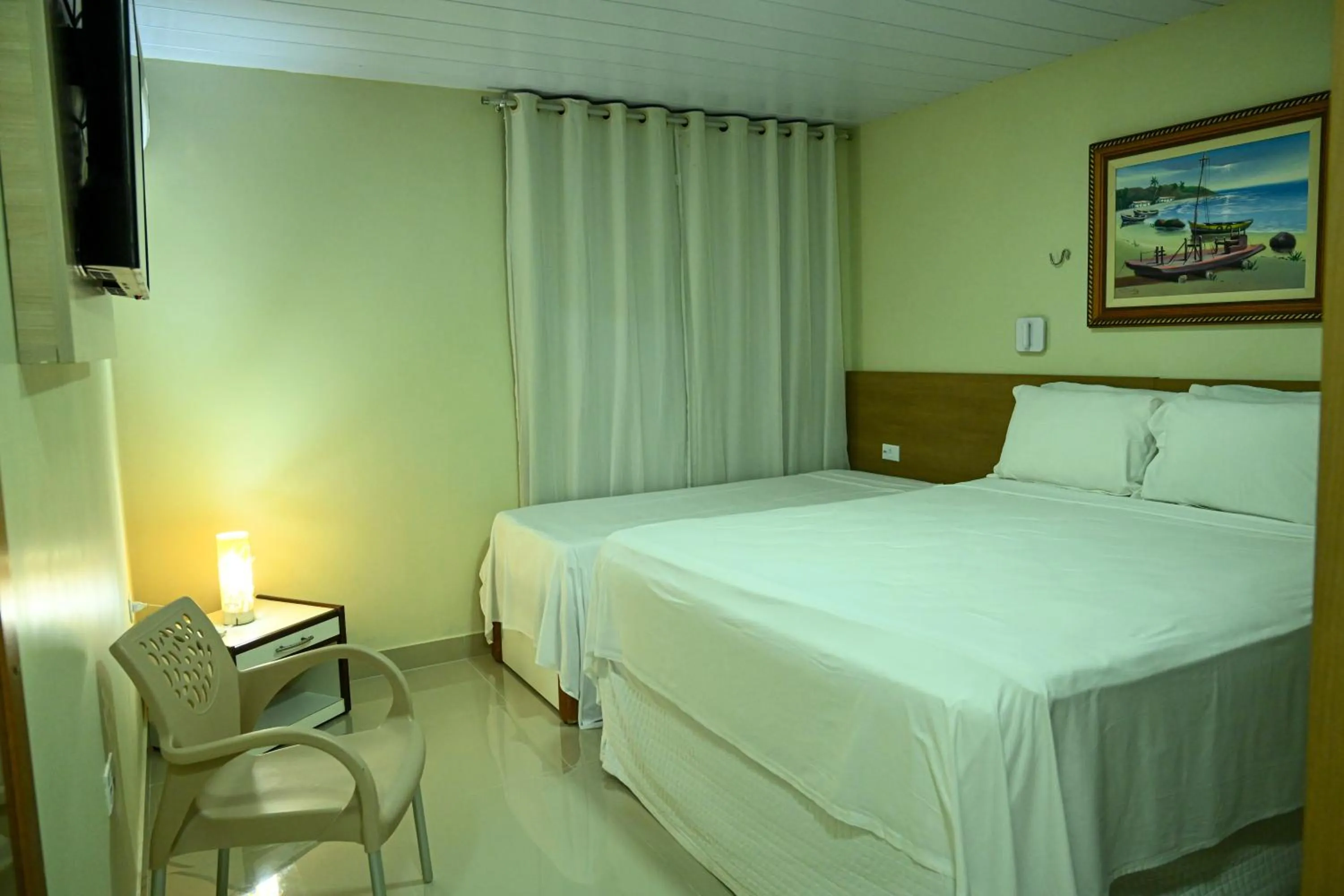 Bed in Pousada Shalom Beach