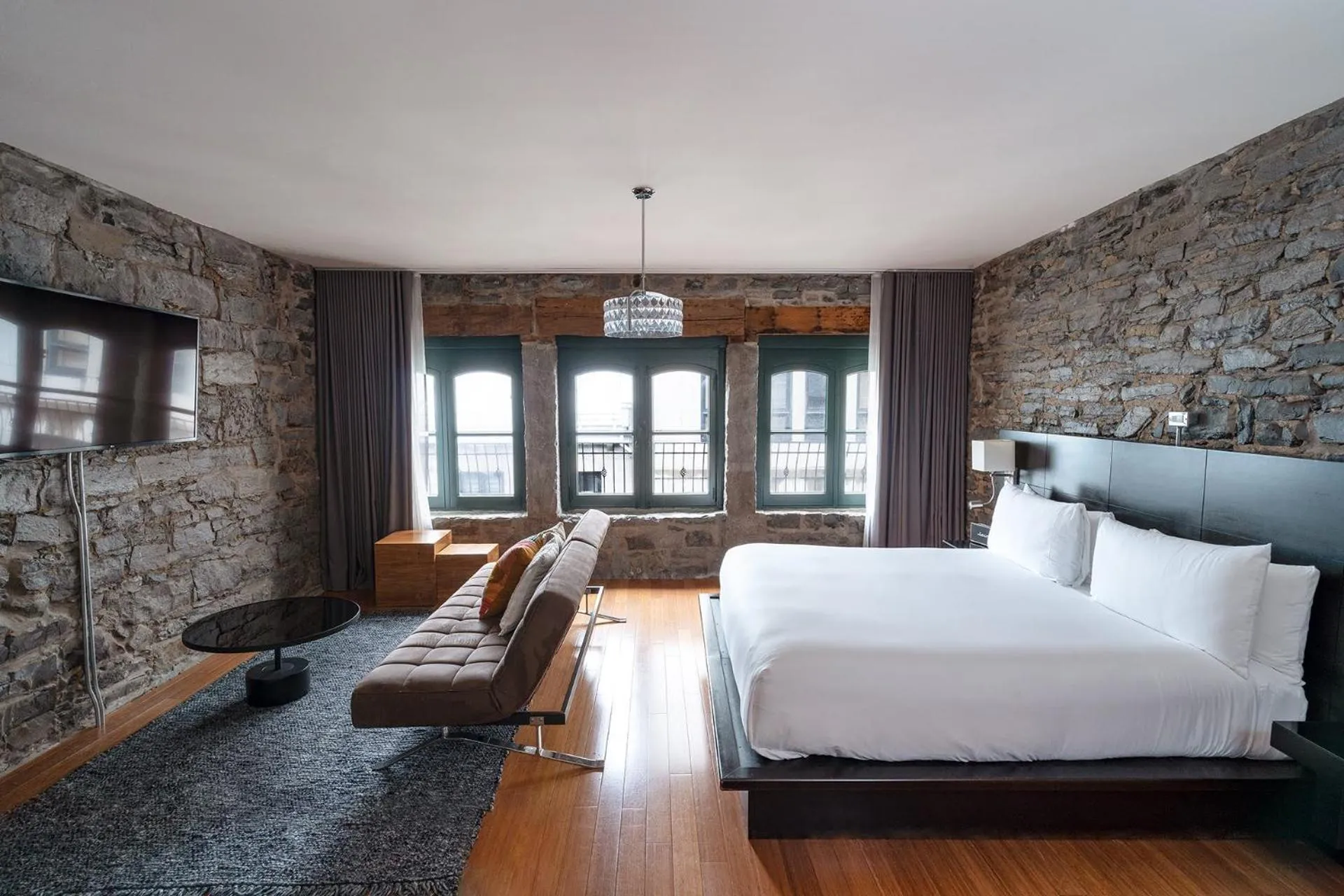 Photo of the whole room, Bed in Le Petit Hôtel Vieux-Montréal - Saint-Paul by Gray Collection