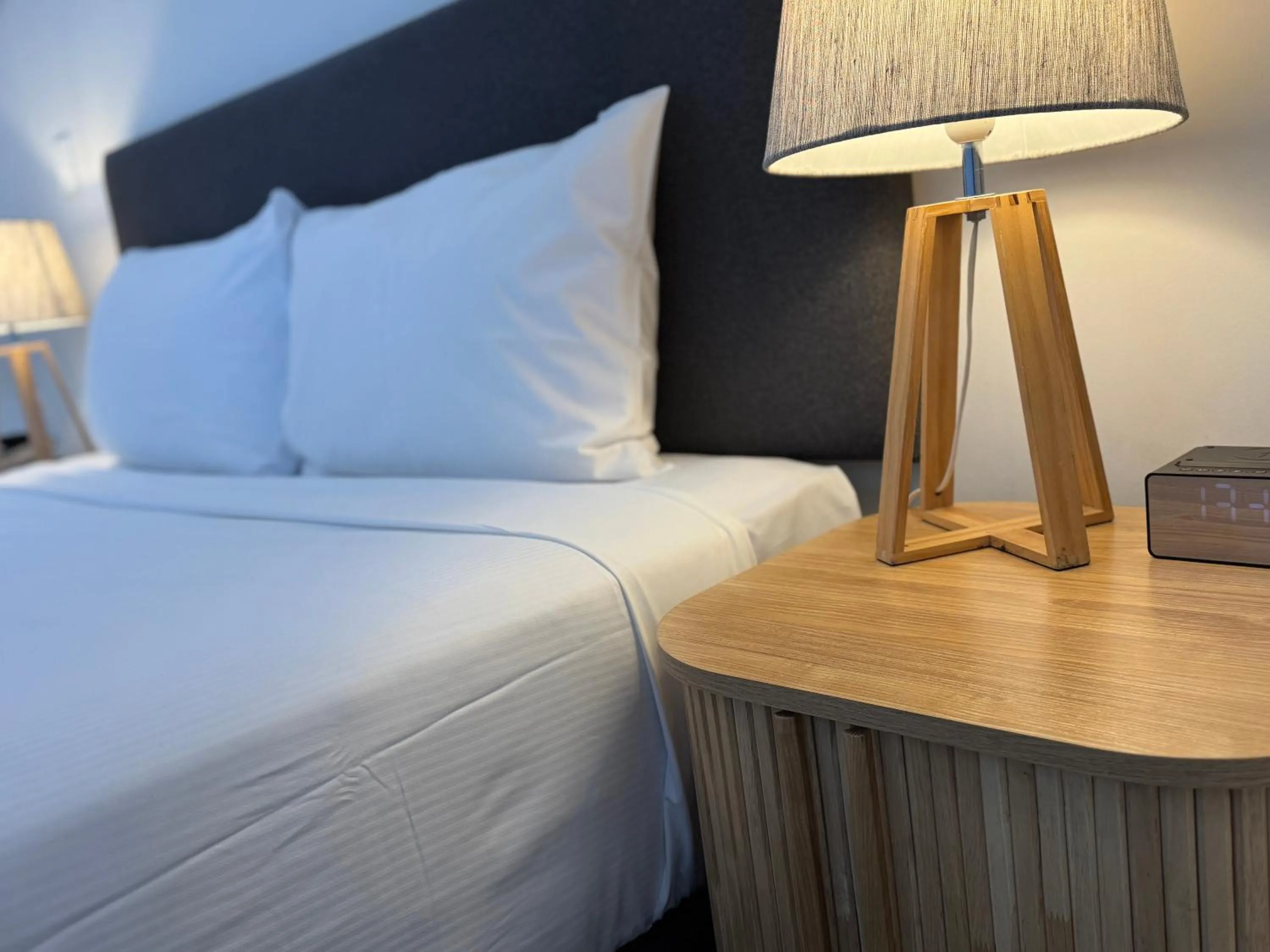 Bed in Quest Henderson, Auckland Apartment Hotel