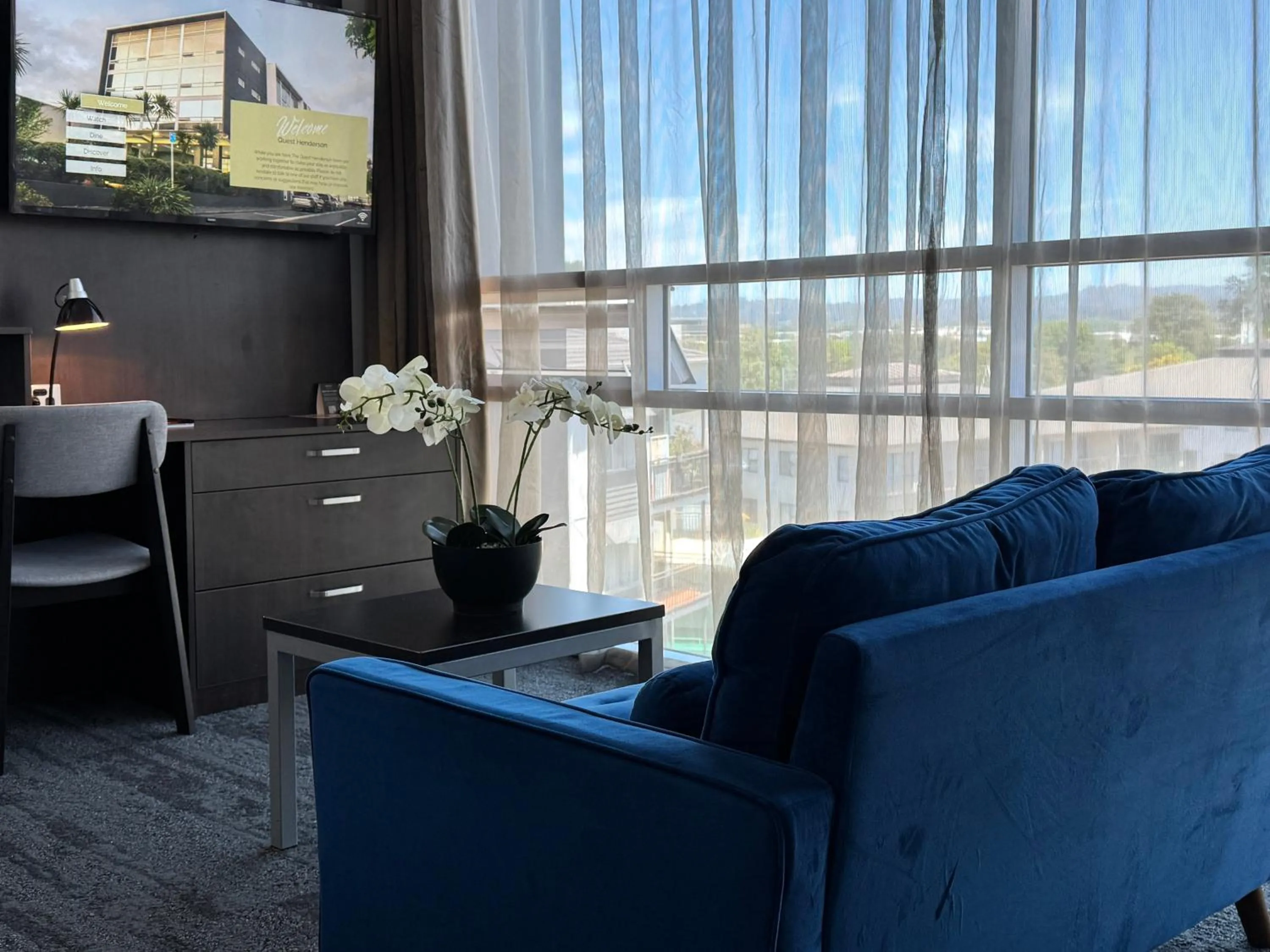 Living room in Quest Henderson, Auckland Apartment Hotel