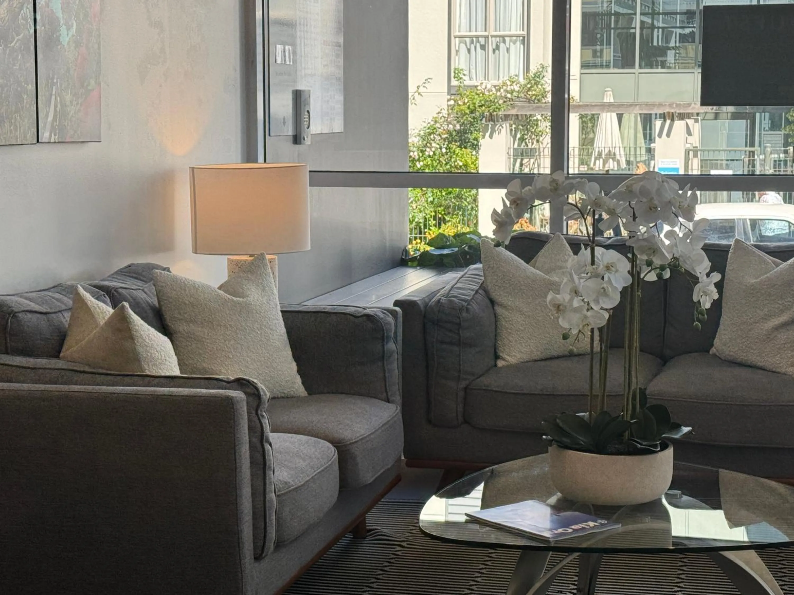 Seating area in Quest Henderson, Auckland Apartment Hotel
