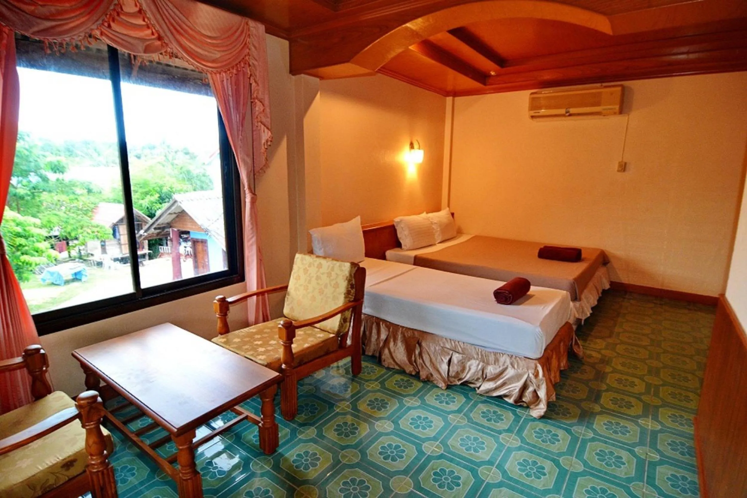 Bed in Blue Andaman Lanta Resort