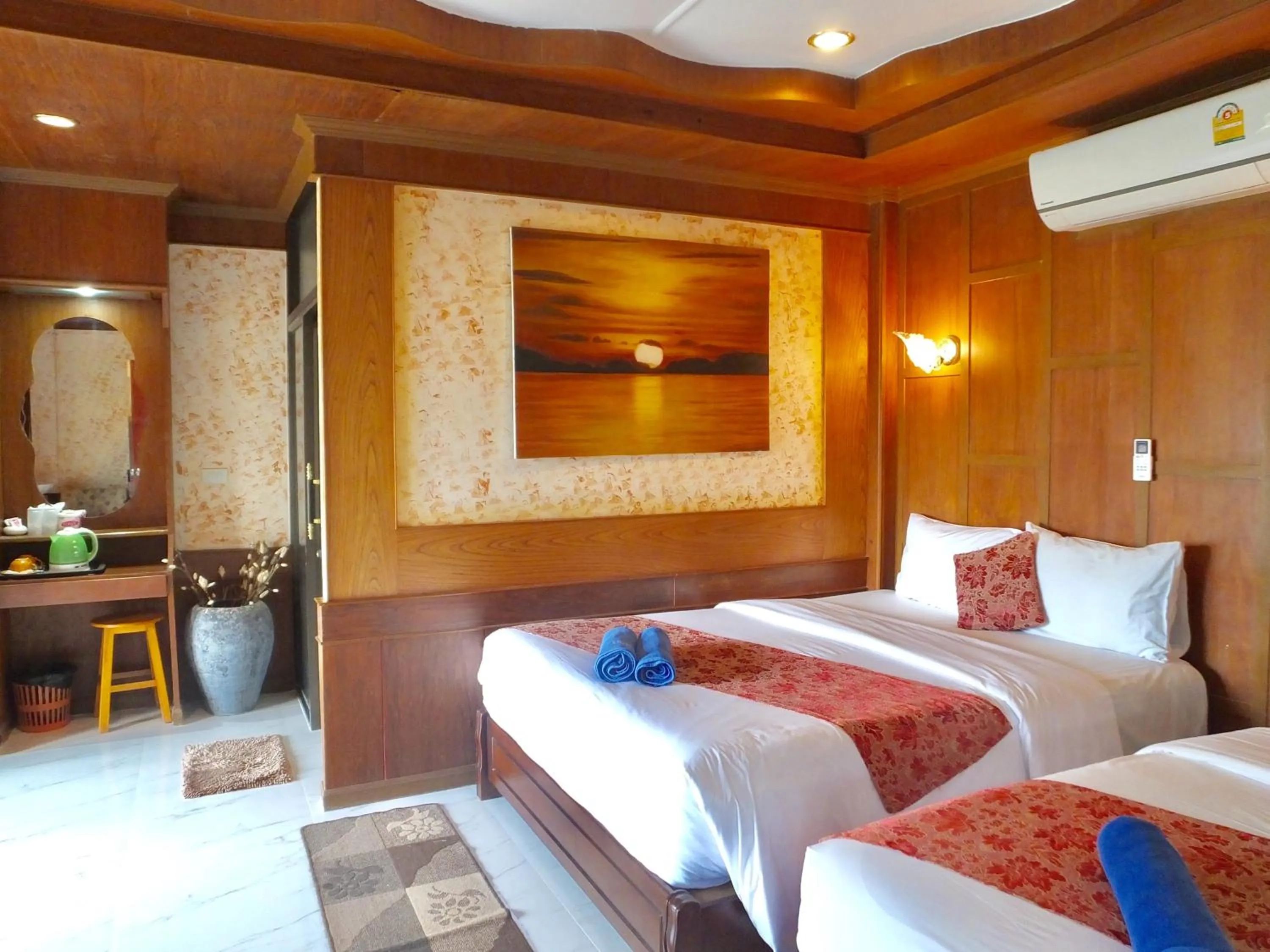 Bed in Blue Andaman Lanta Resort