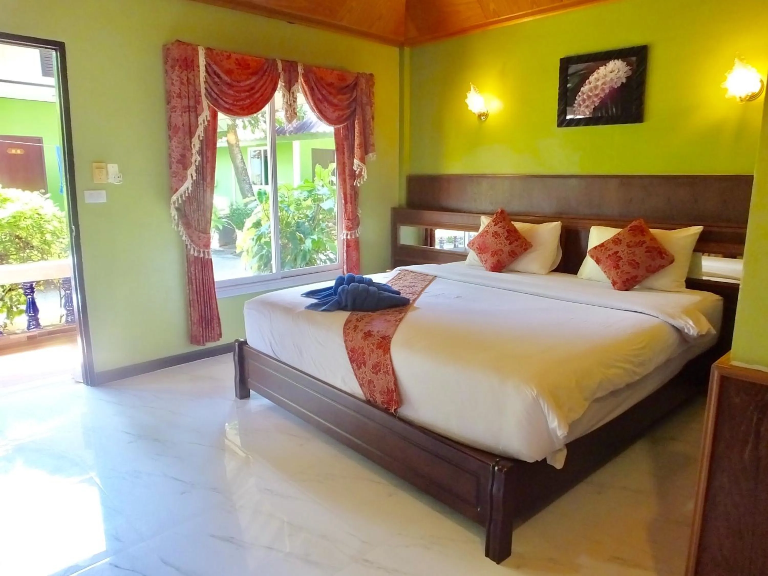 Bed in Blue Andaman Lanta Resort