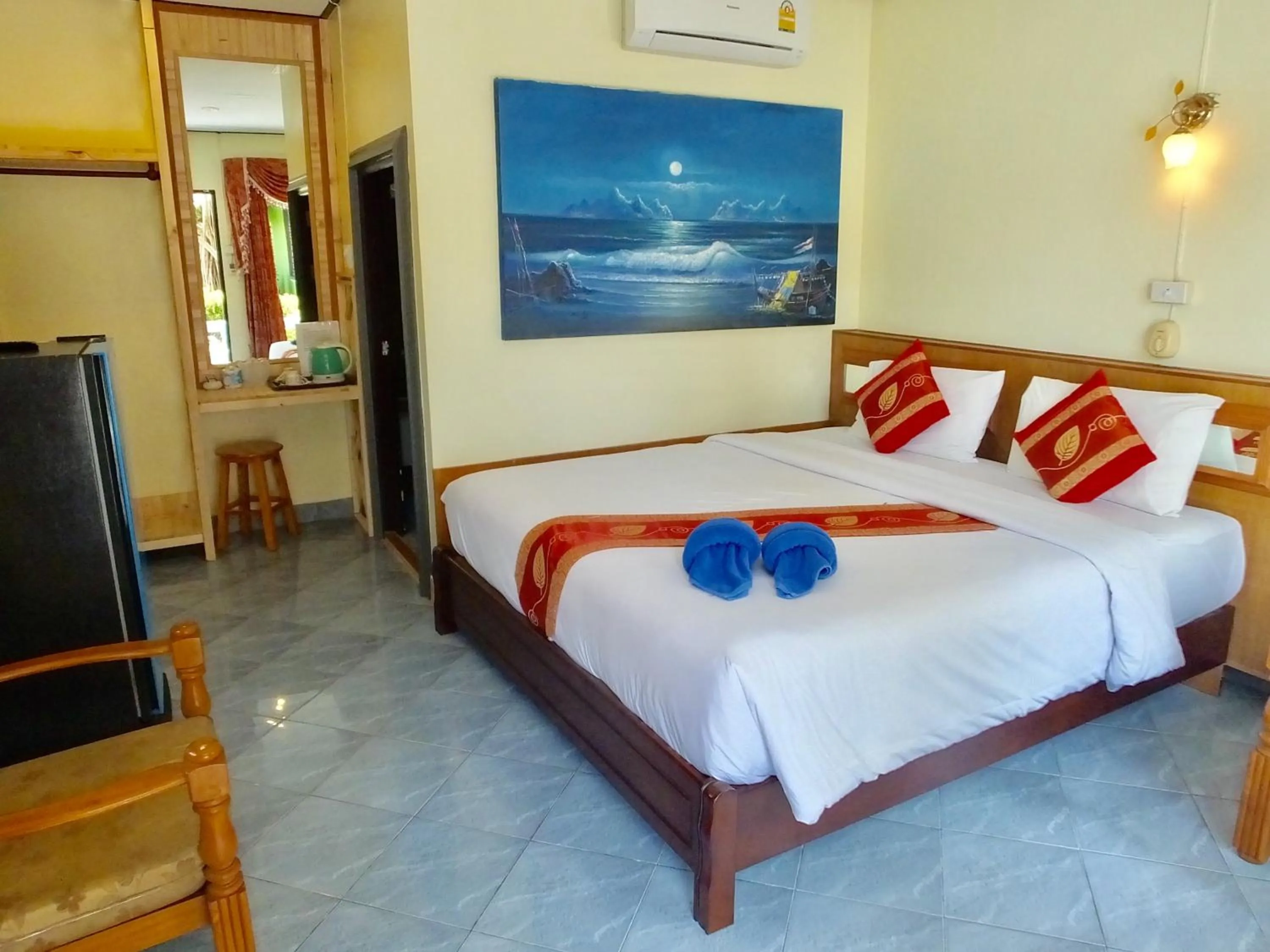Bed in Blue Andaman Lanta Resort
