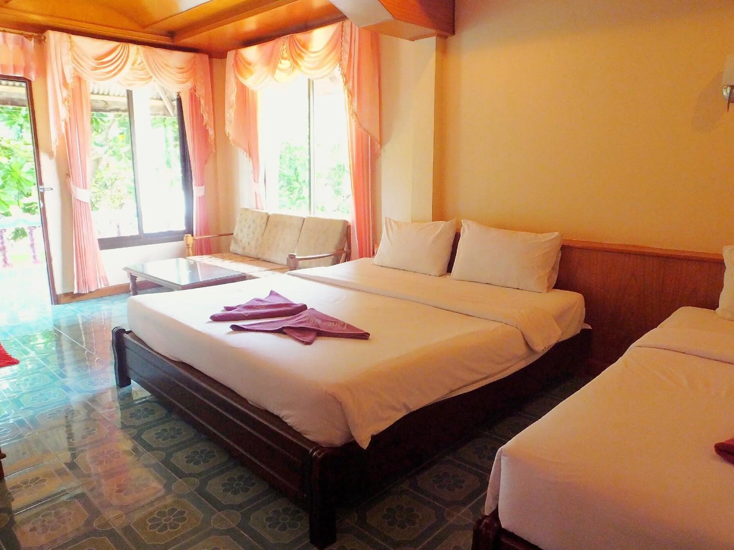 Bed in Blue Andaman Lanta Resort