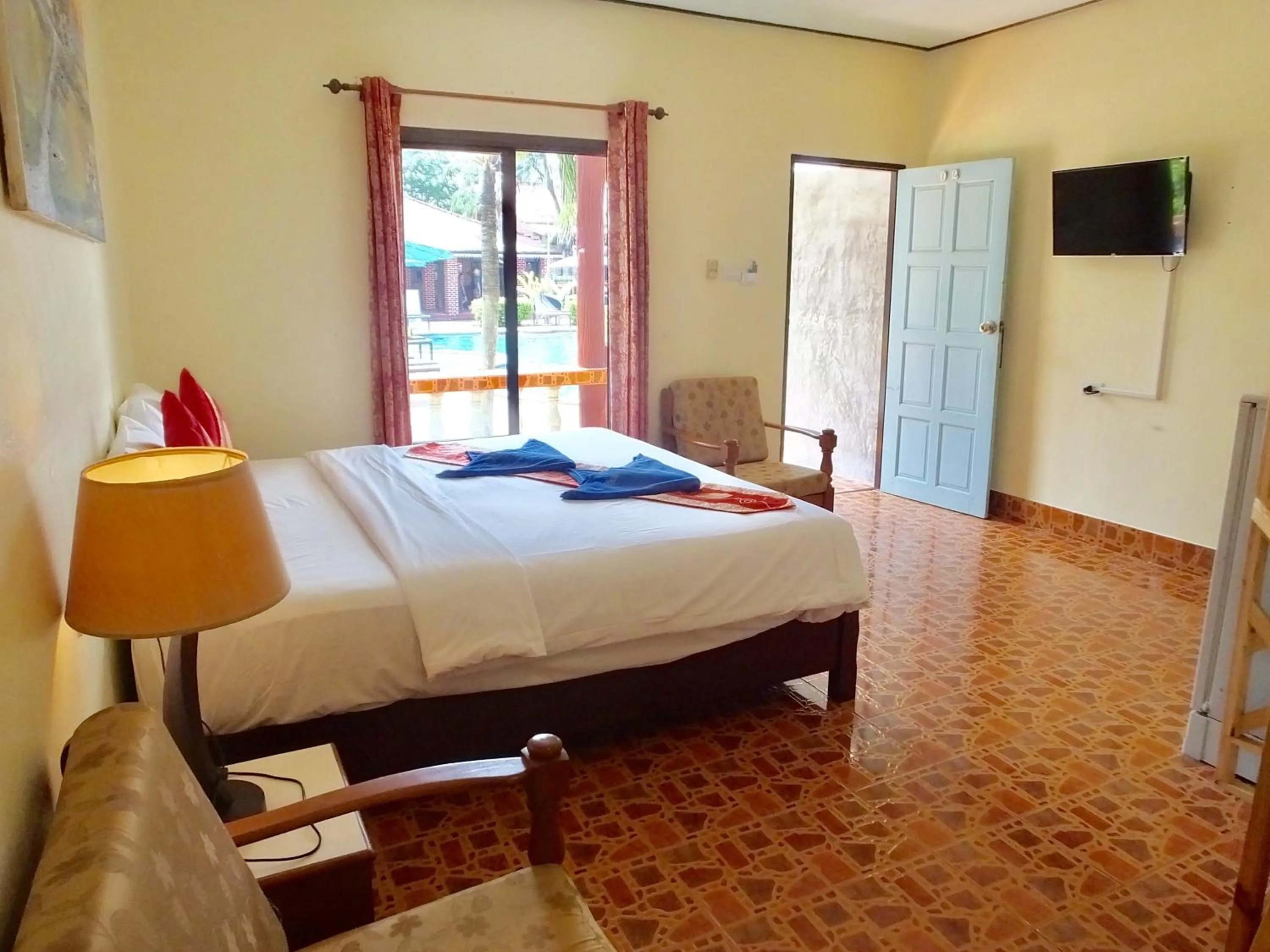 Bed in Blue Andaman Lanta Resort