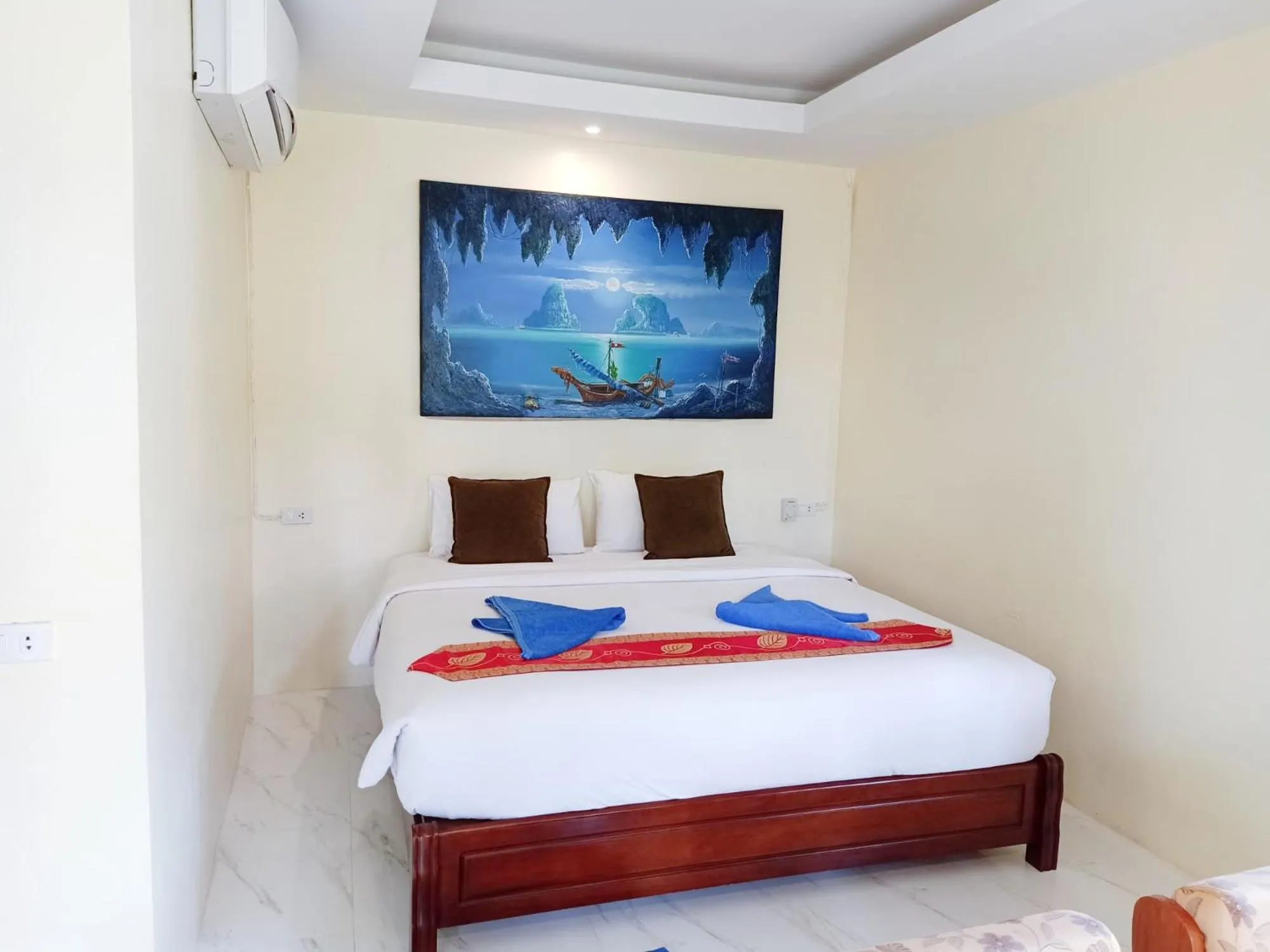 Bed in Blue Andaman Lanta Resort