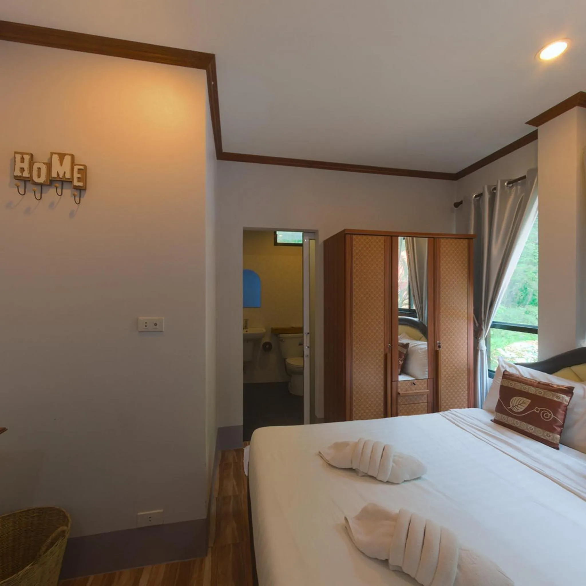 Photo of the whole room, Bed in Rim Khao Resort