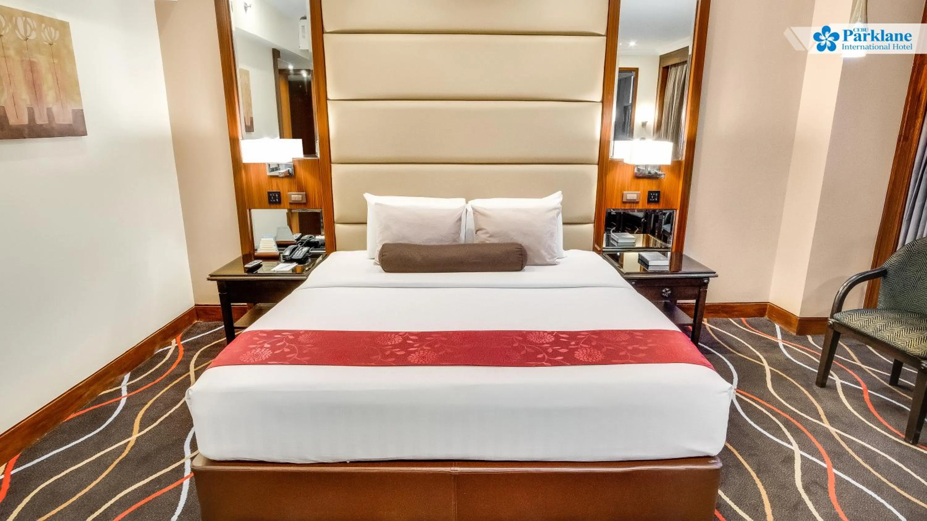 Bed in Cebu Parklane International Hotel