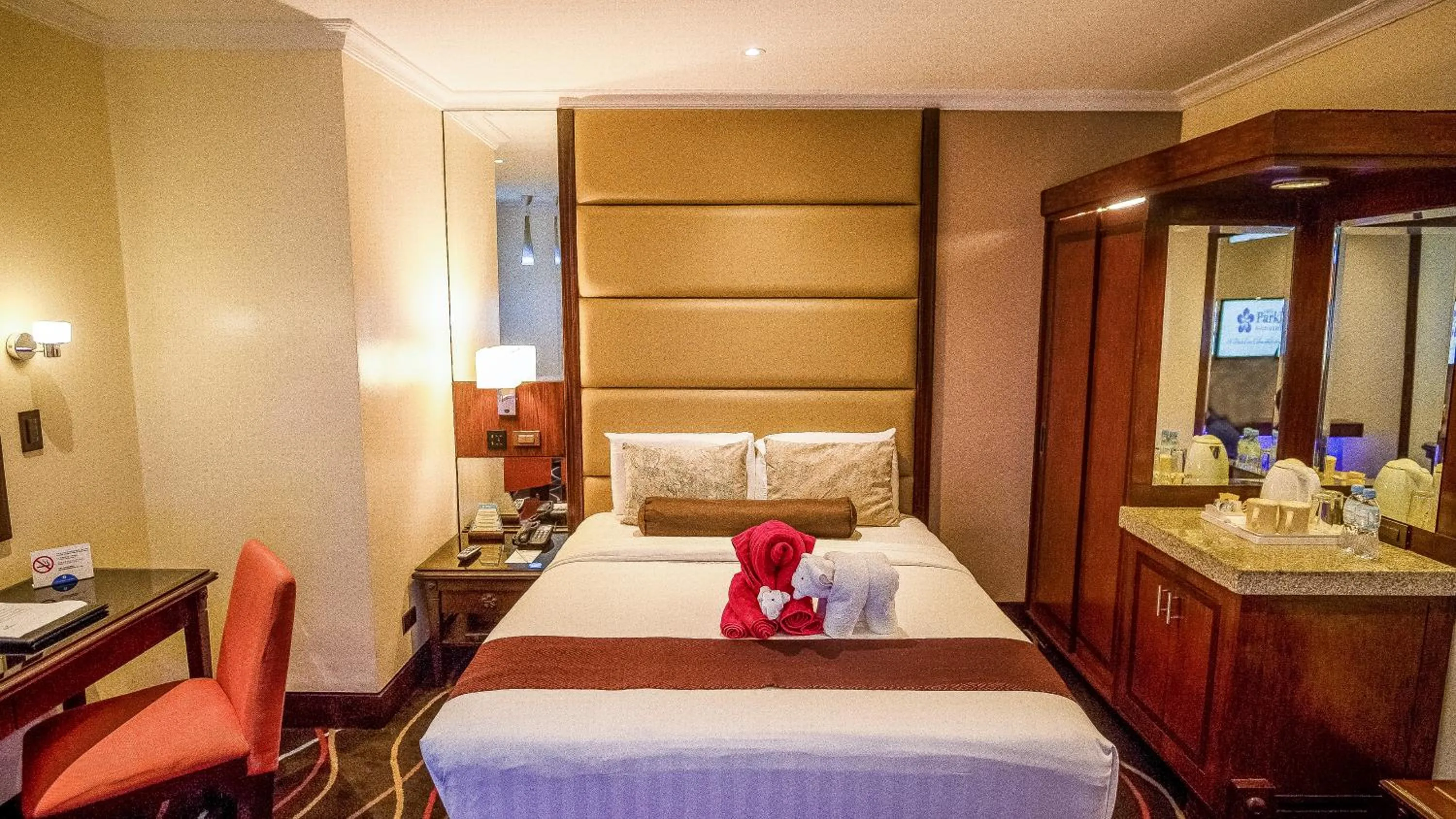 Bed in Cebu Parklane International Hotel