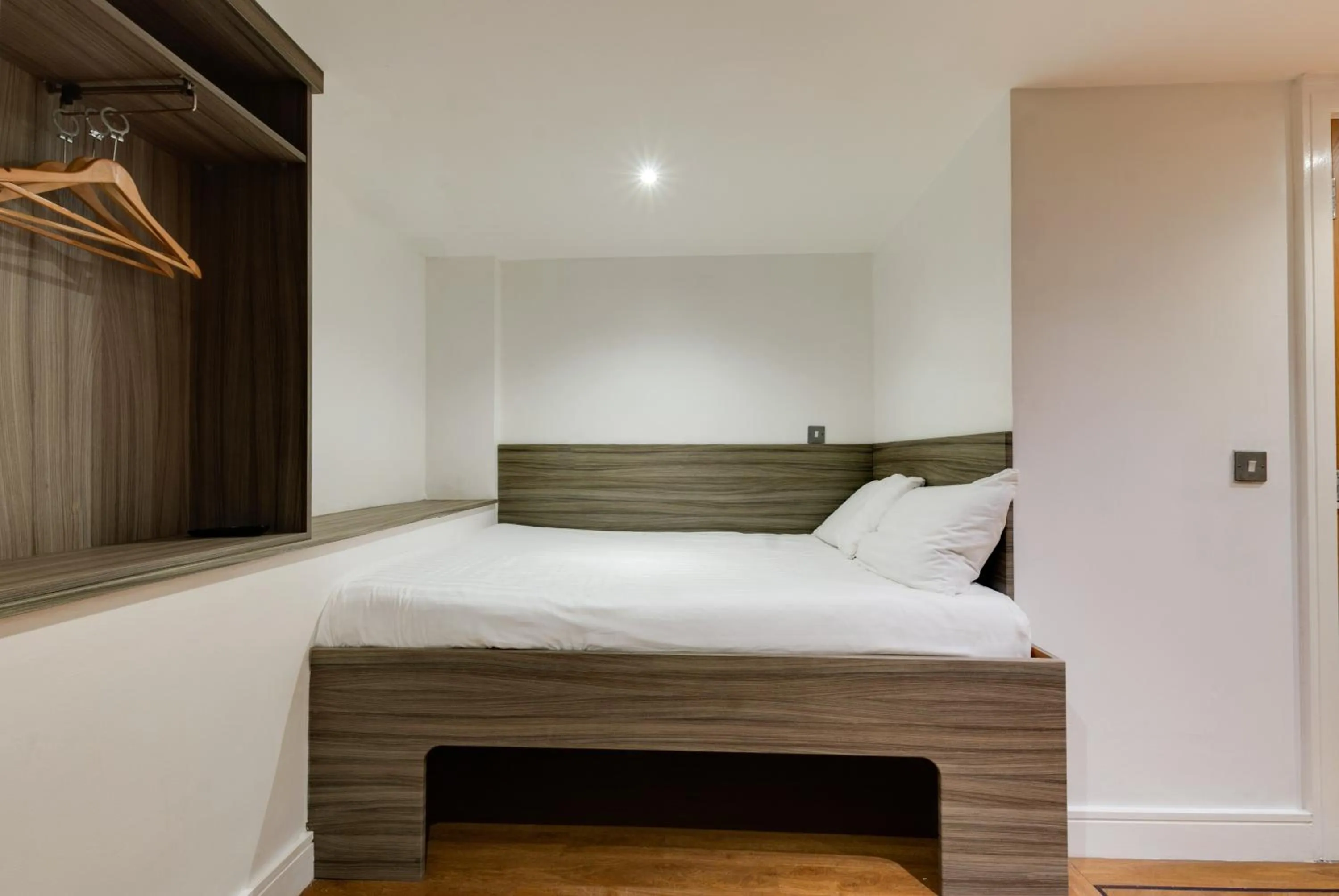 Bed in The Podworks Hotel