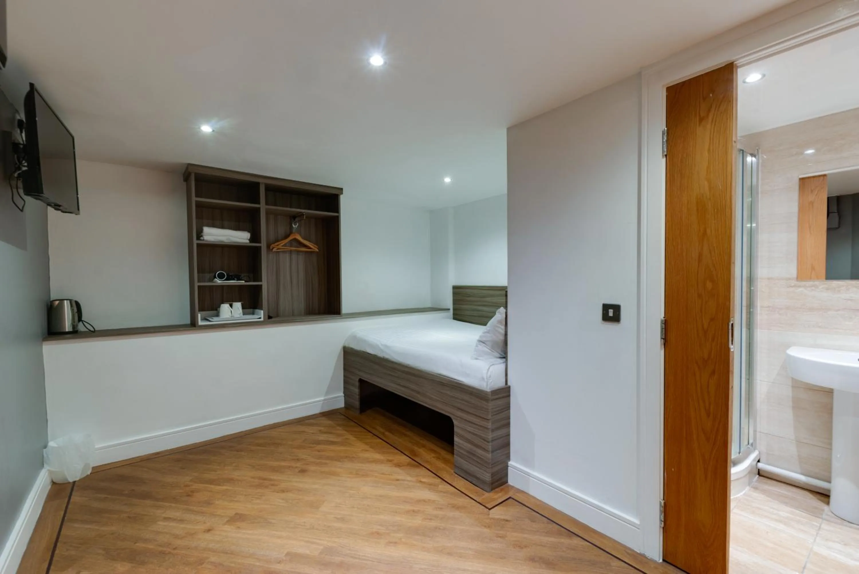 Bed in The Podworks Hotel