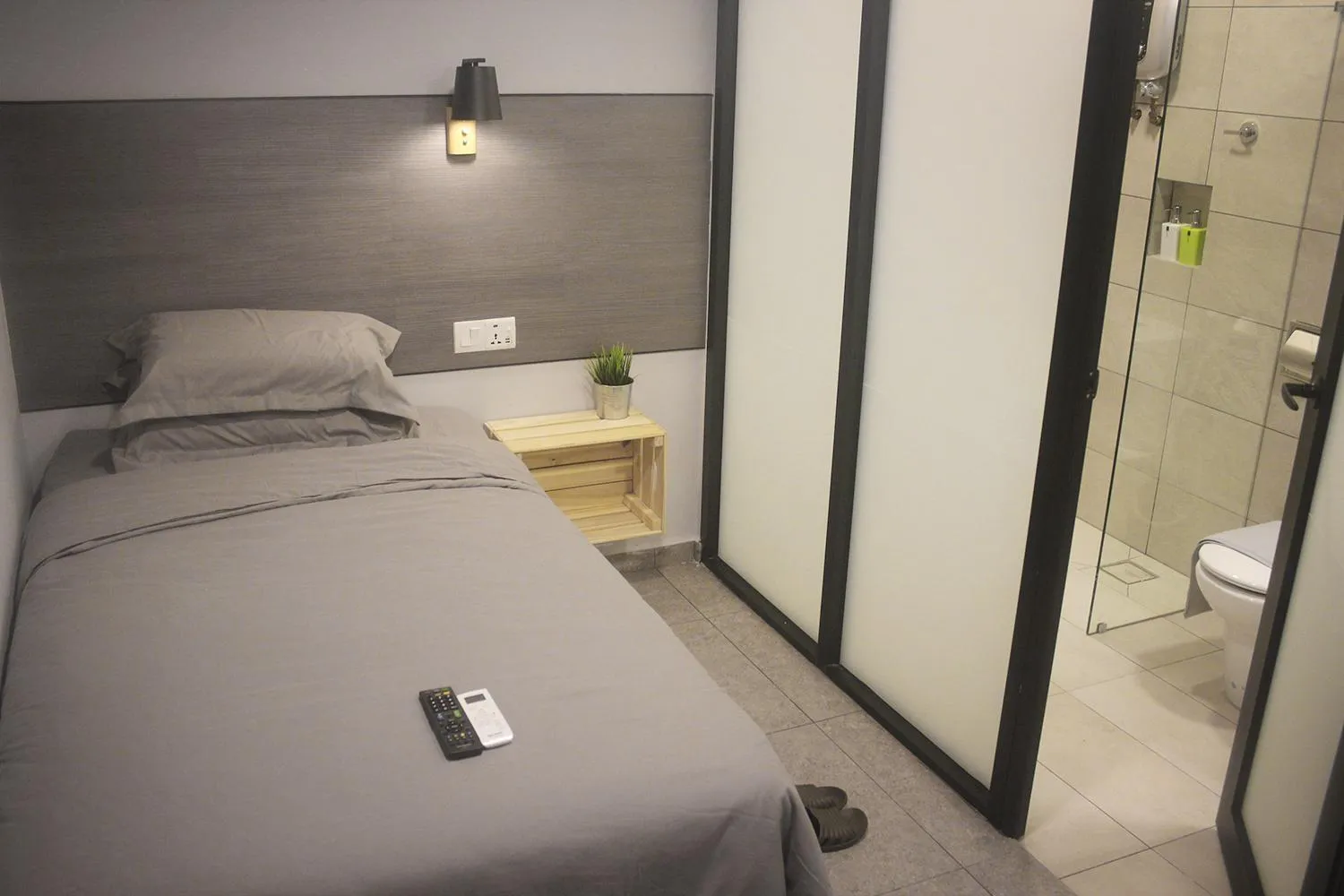 Bed in Vertilex Hotel