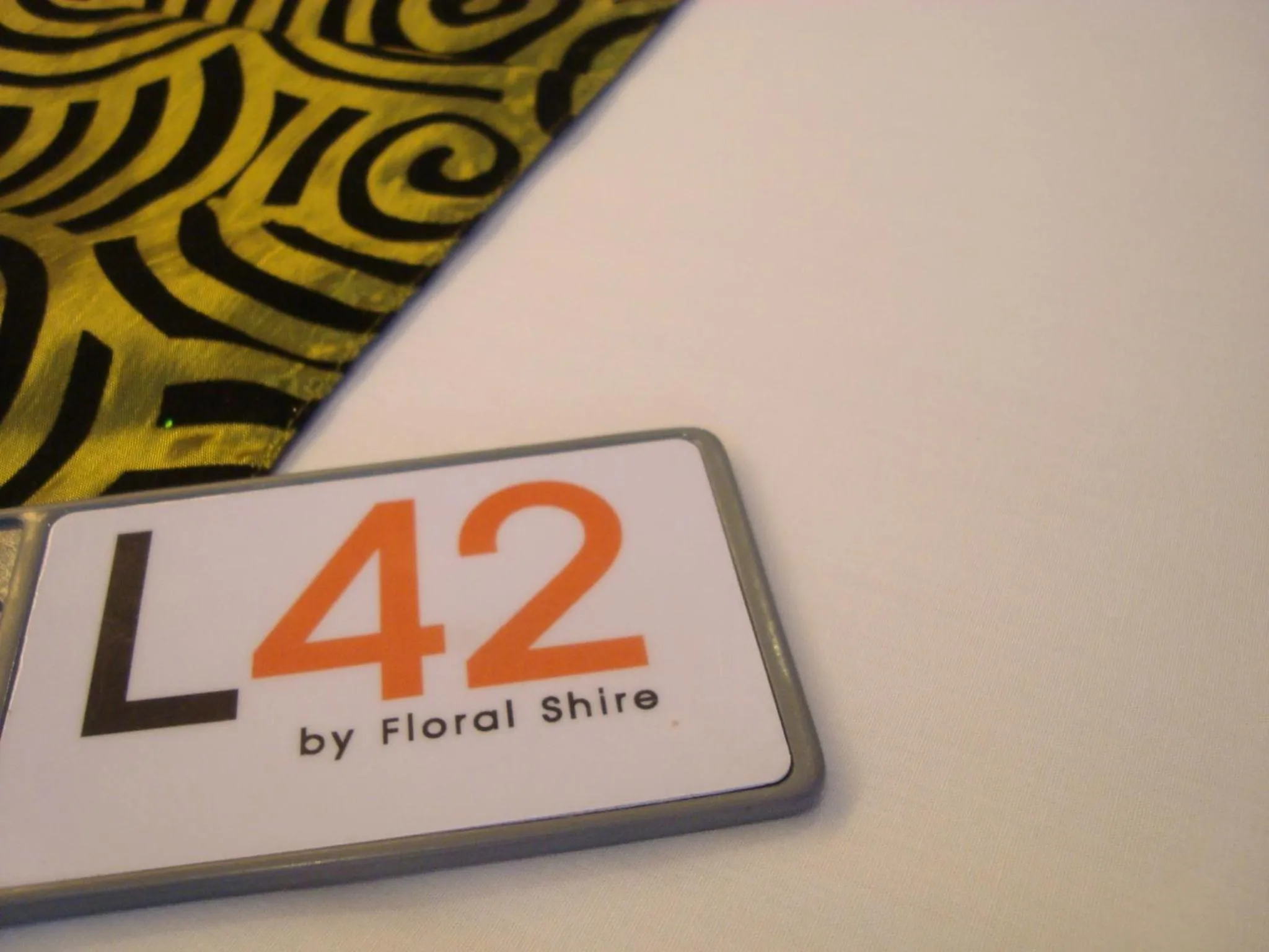 Property logo or sign in L42 Hostel Suvarnabhumi Airport