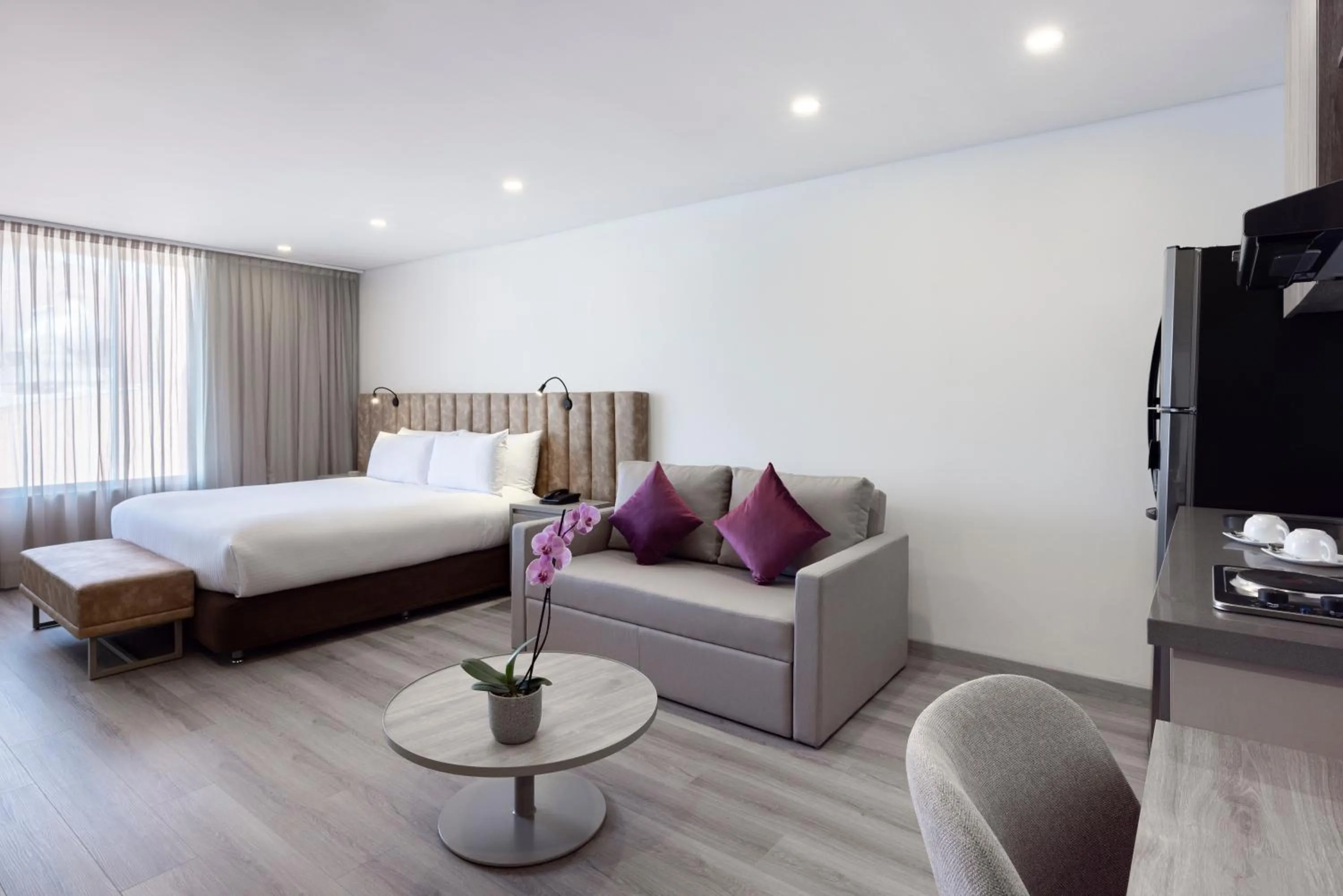 Living room, Bed in Hotel Jazz Apartments