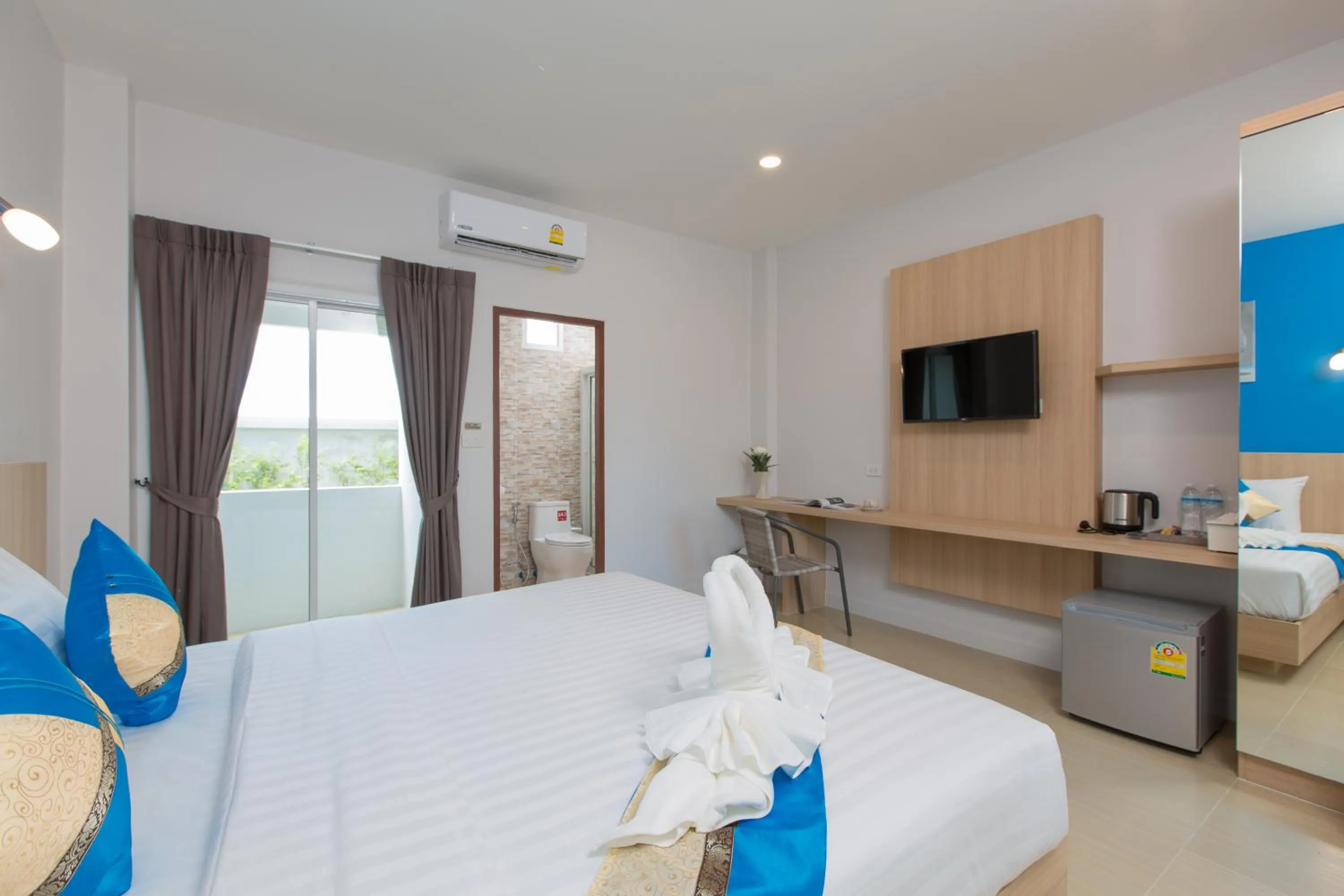 Bed in Phant at Thalang Service Apartment