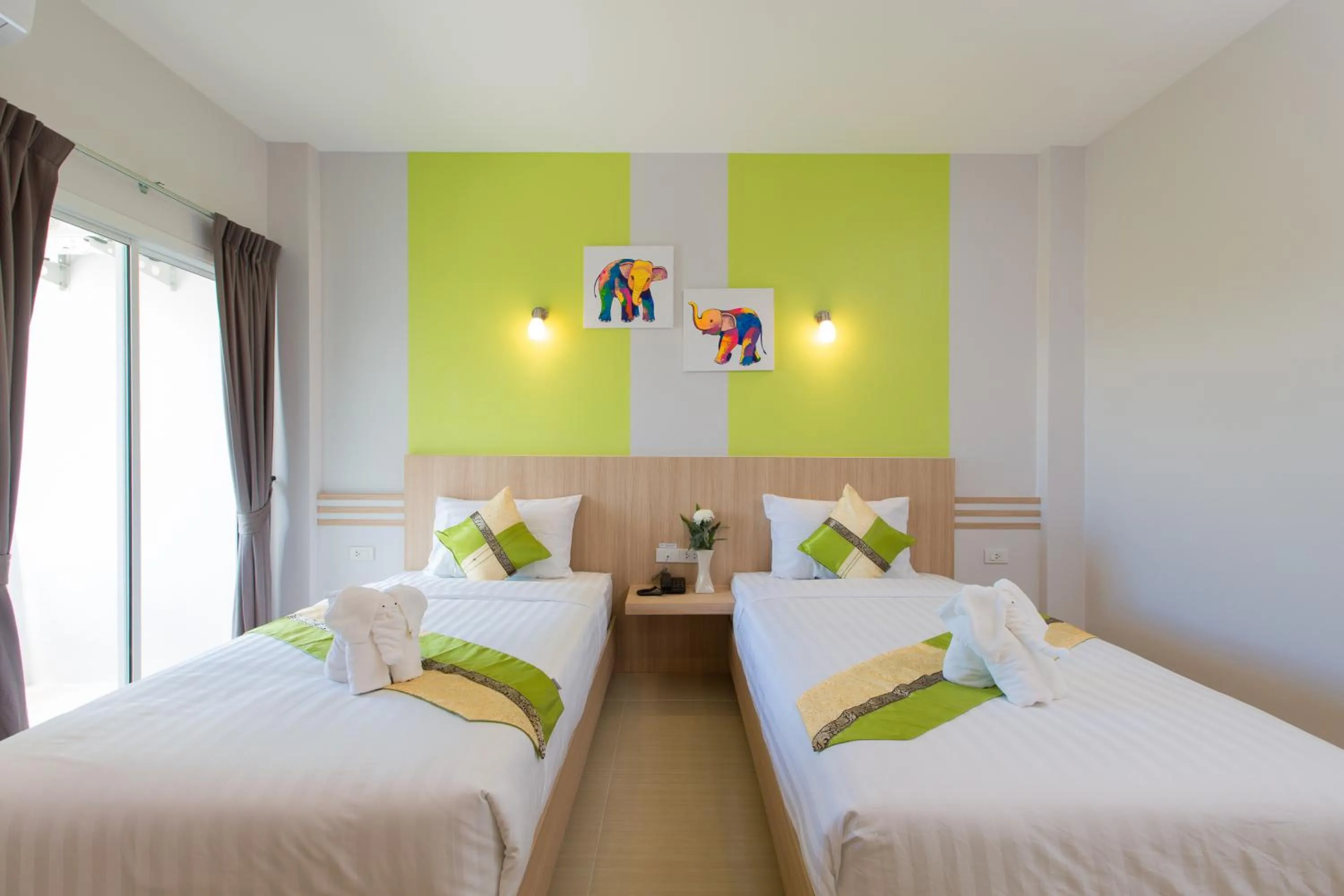 Bed in Phant at Thalang Service Apartment