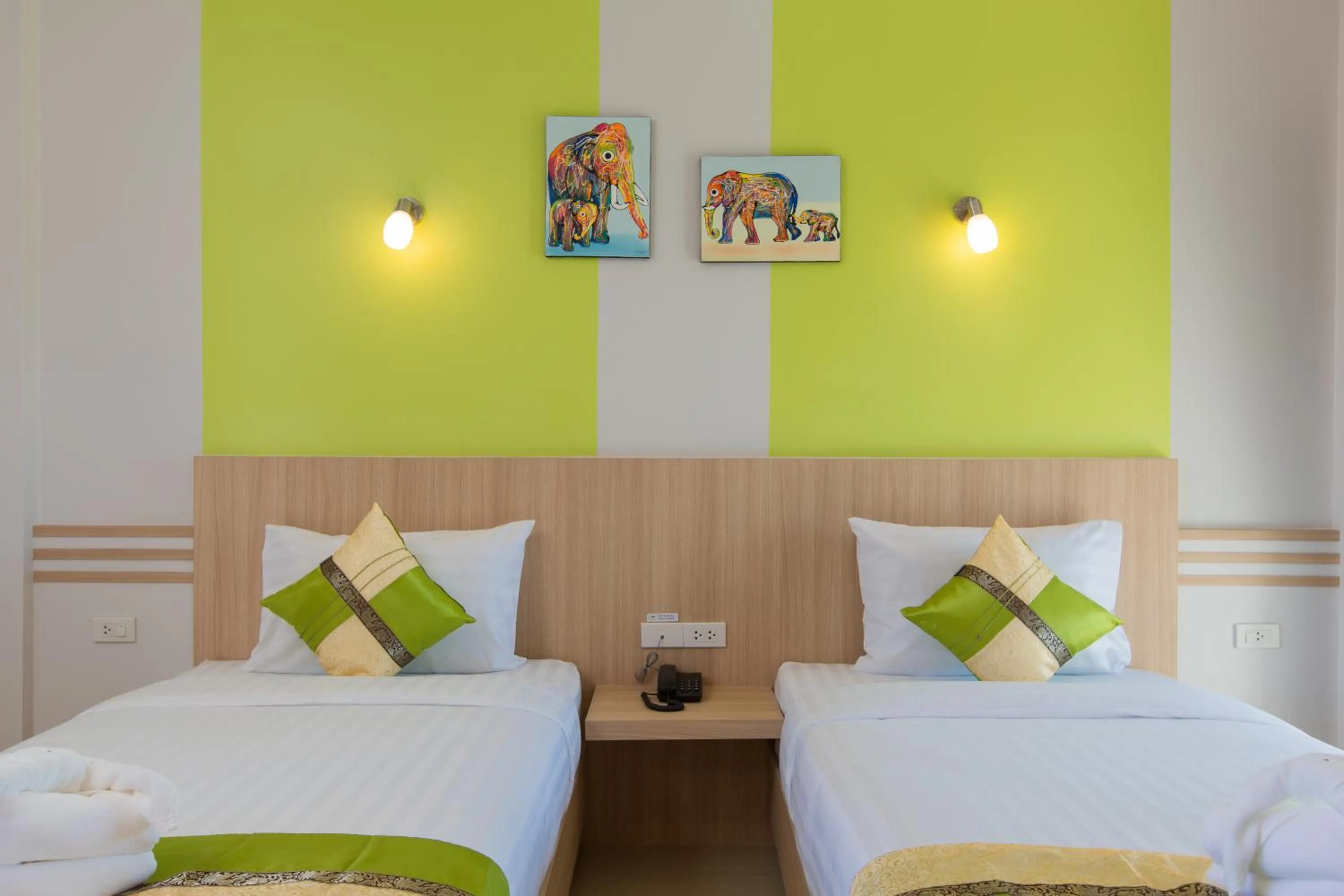 Bed in Phant at Thalang Service Apartment