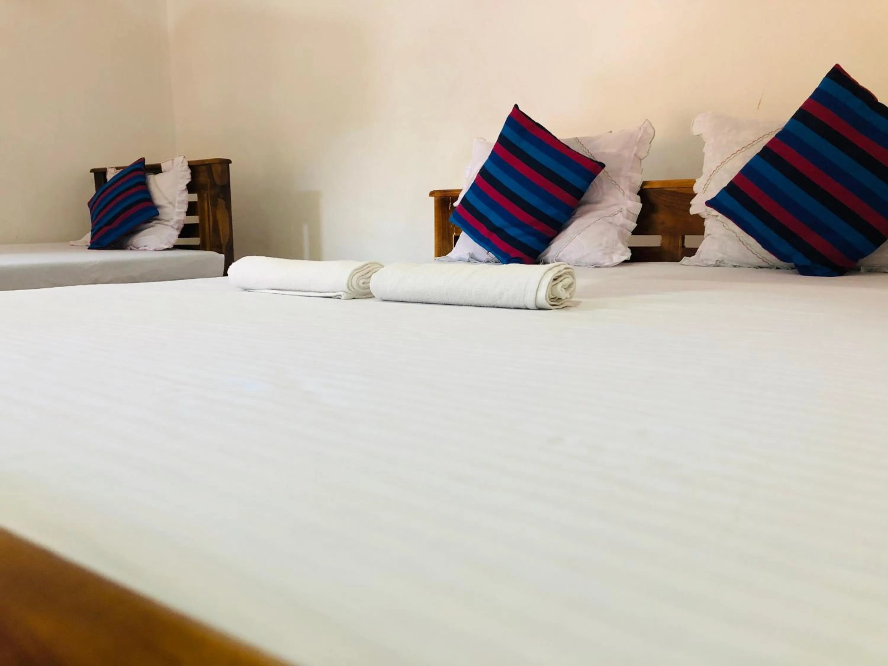 Bed in Kumari Guest House