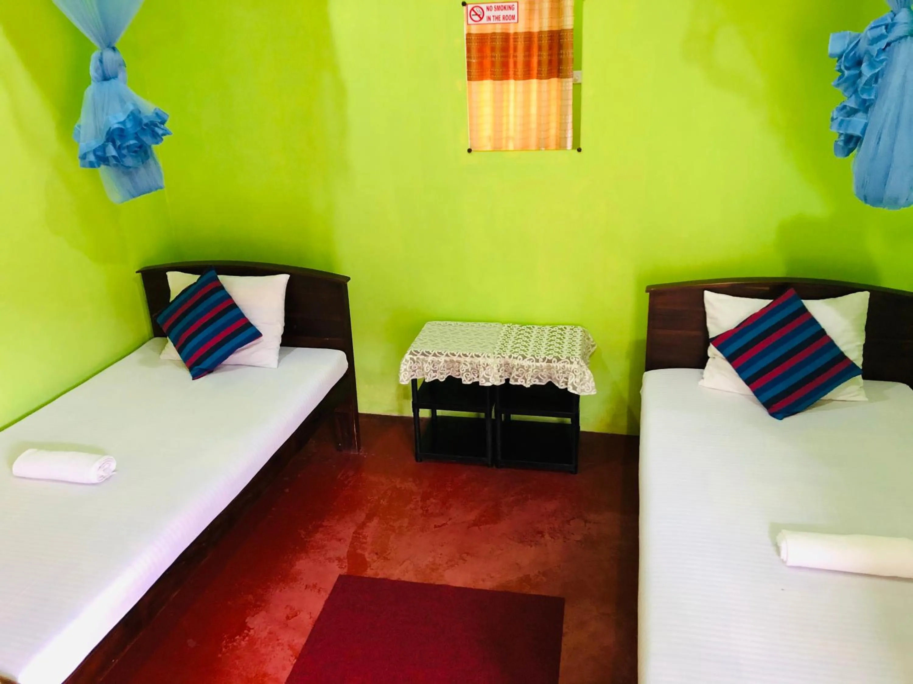 Bed in Kumari Guest House