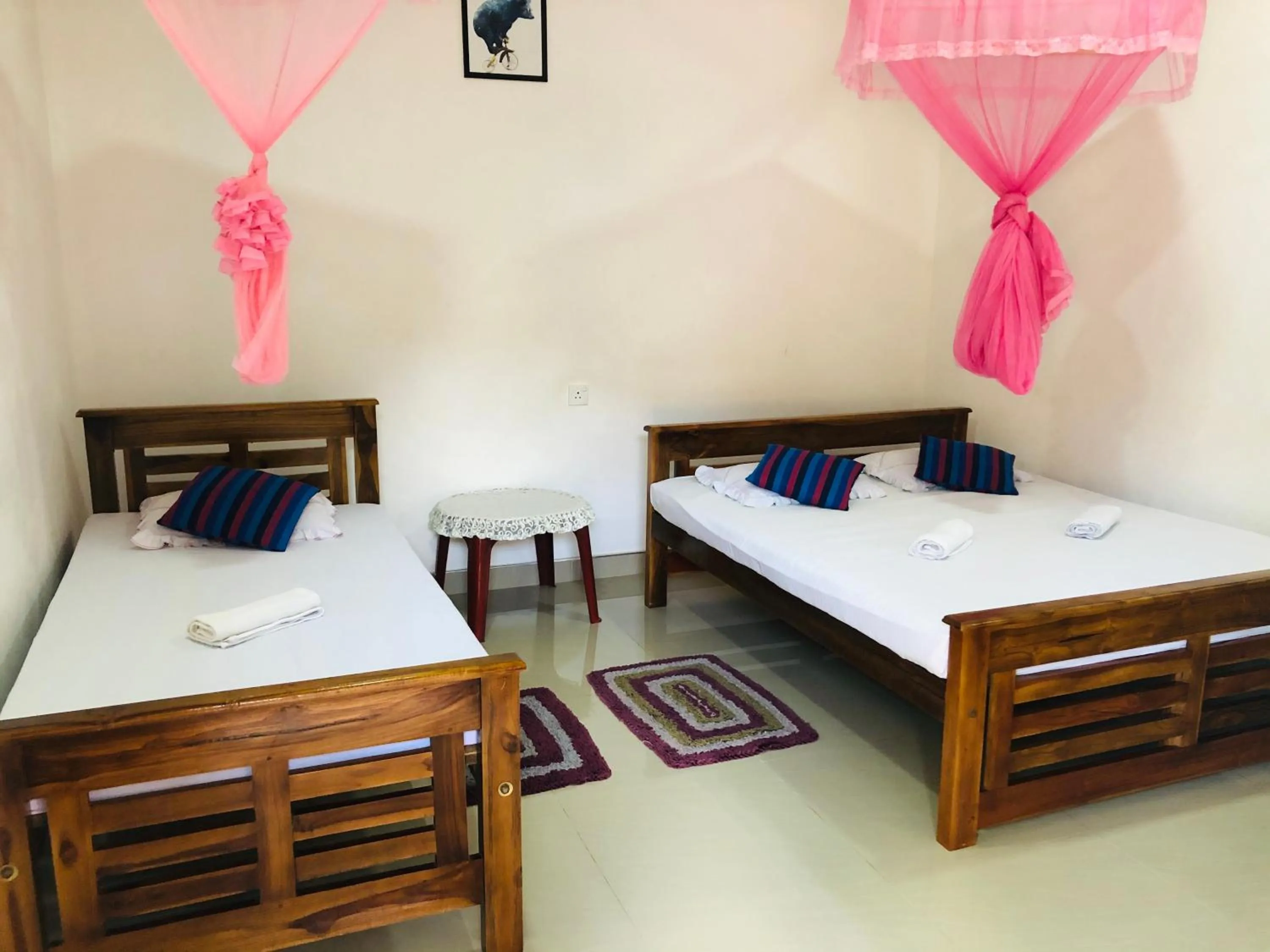 Bed in Kumari Guest House