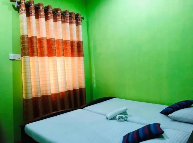 Bed in Kumari Guest House