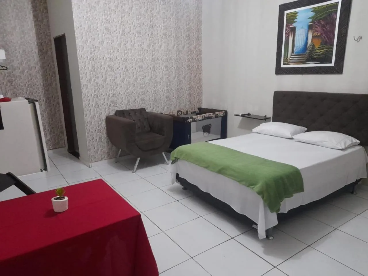 Bed in Pousada e Posto Amigão