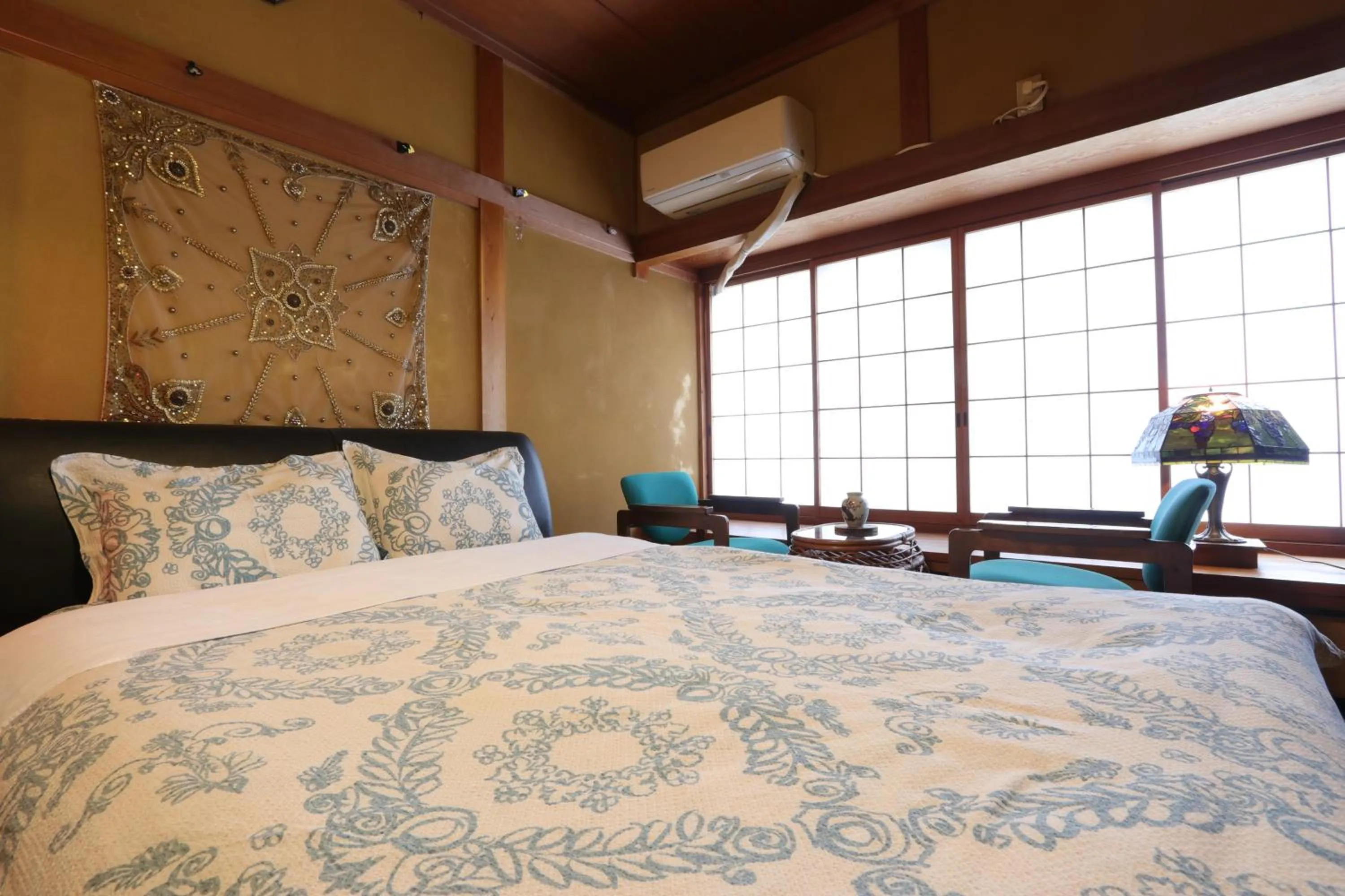 Bed in Shanti House Sakaiminato