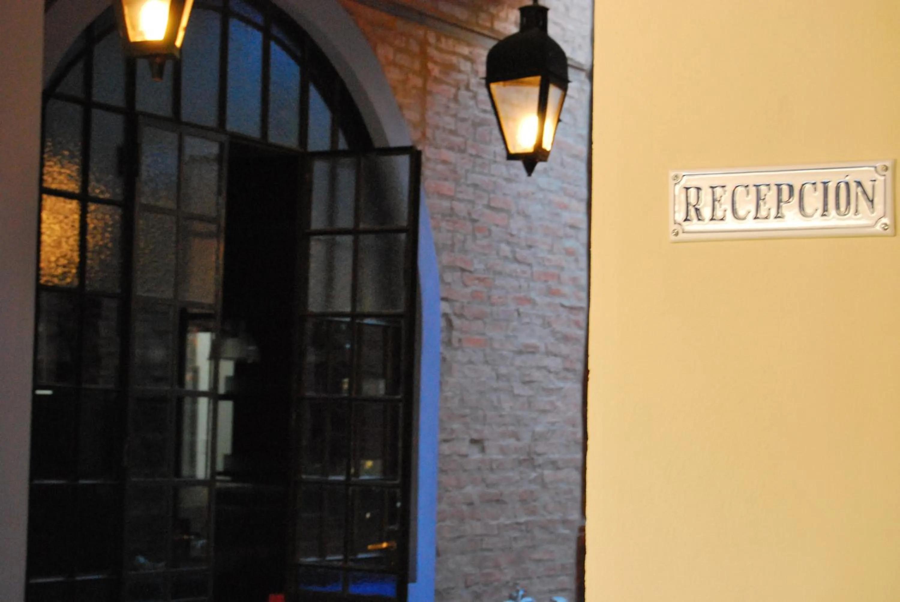 Facade/entrance in La Rozada Suites