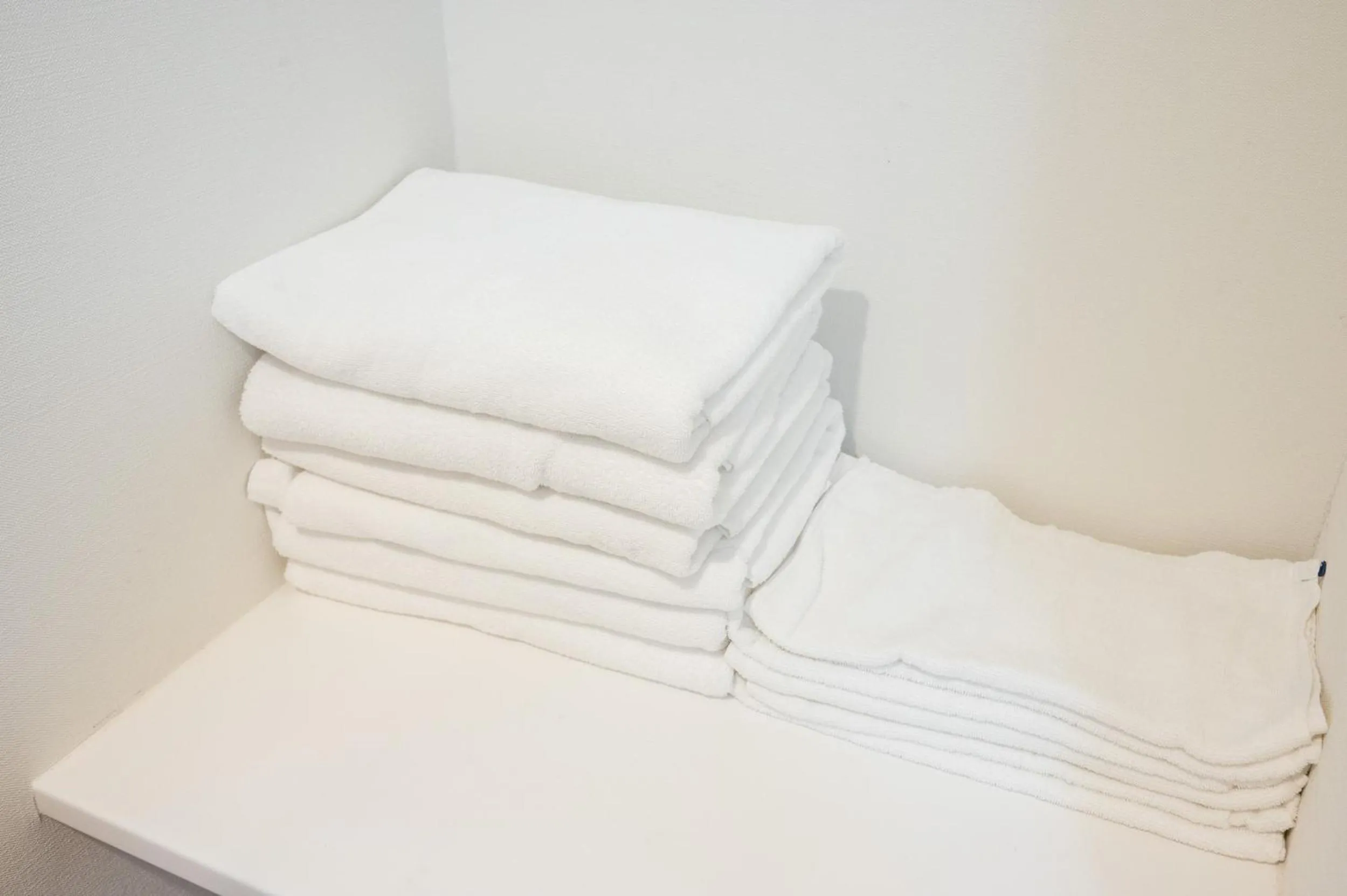 towels, Bed in Residence Hotel Hakata 8