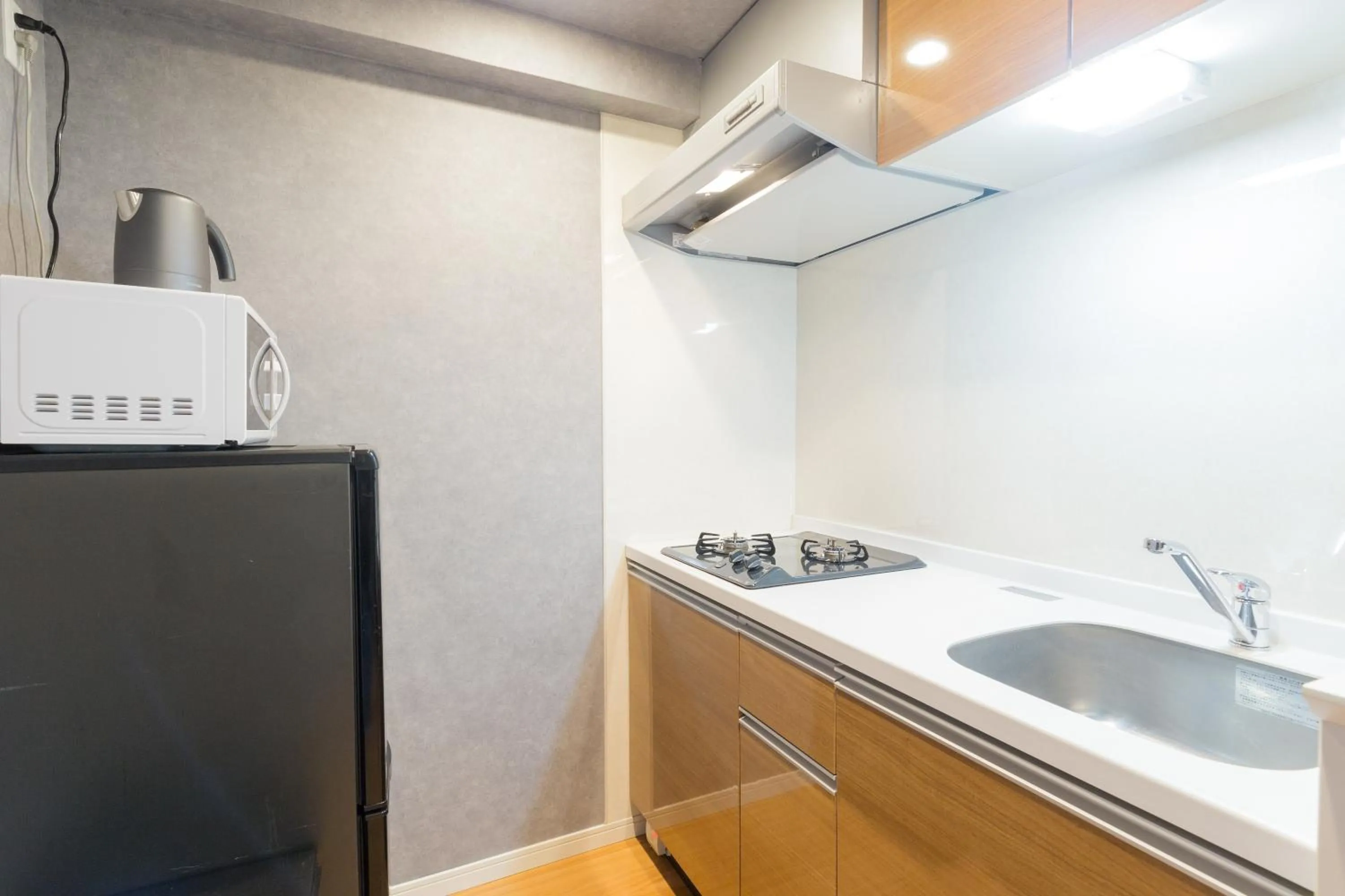 Kitchen or kitchenette in Residence Hotel Hakata 8