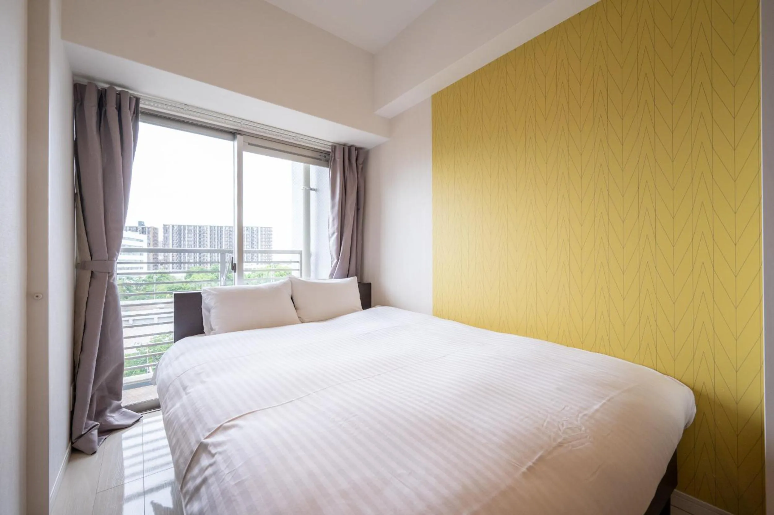 View (from property/room), Bed in Residence Hotel Hakata 8