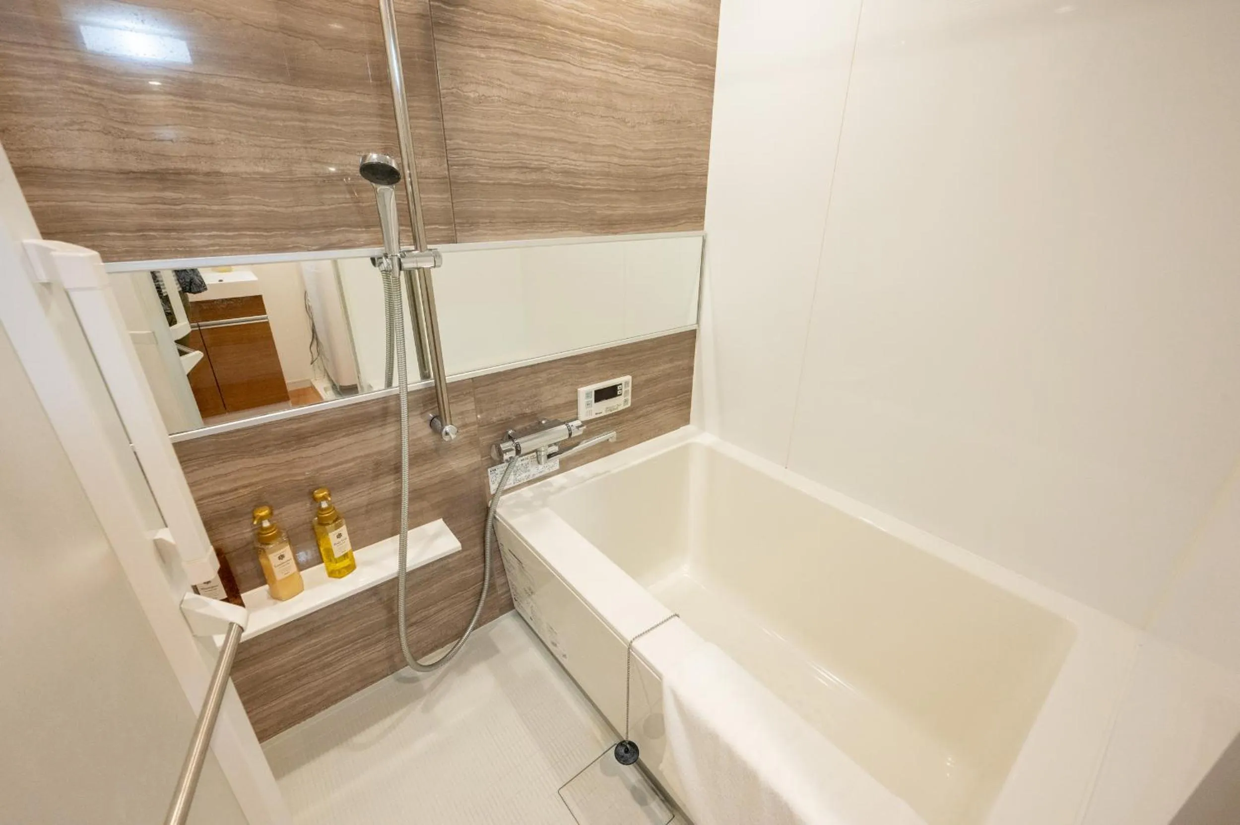 Bathroom in Residence Hotel Hakata 8
