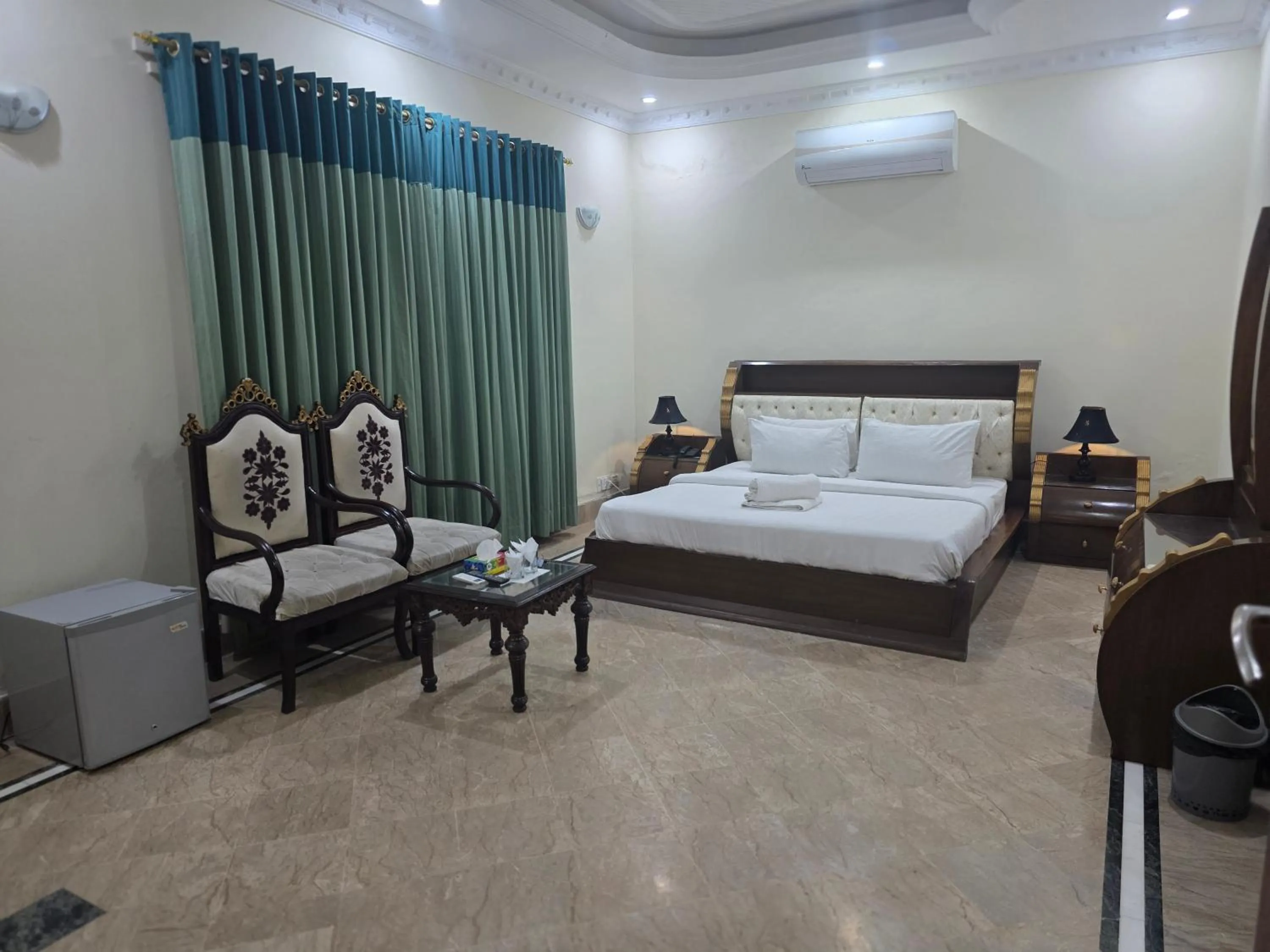 Photo of the whole room, Bed in Executive Galaxy Guest House Islamabad