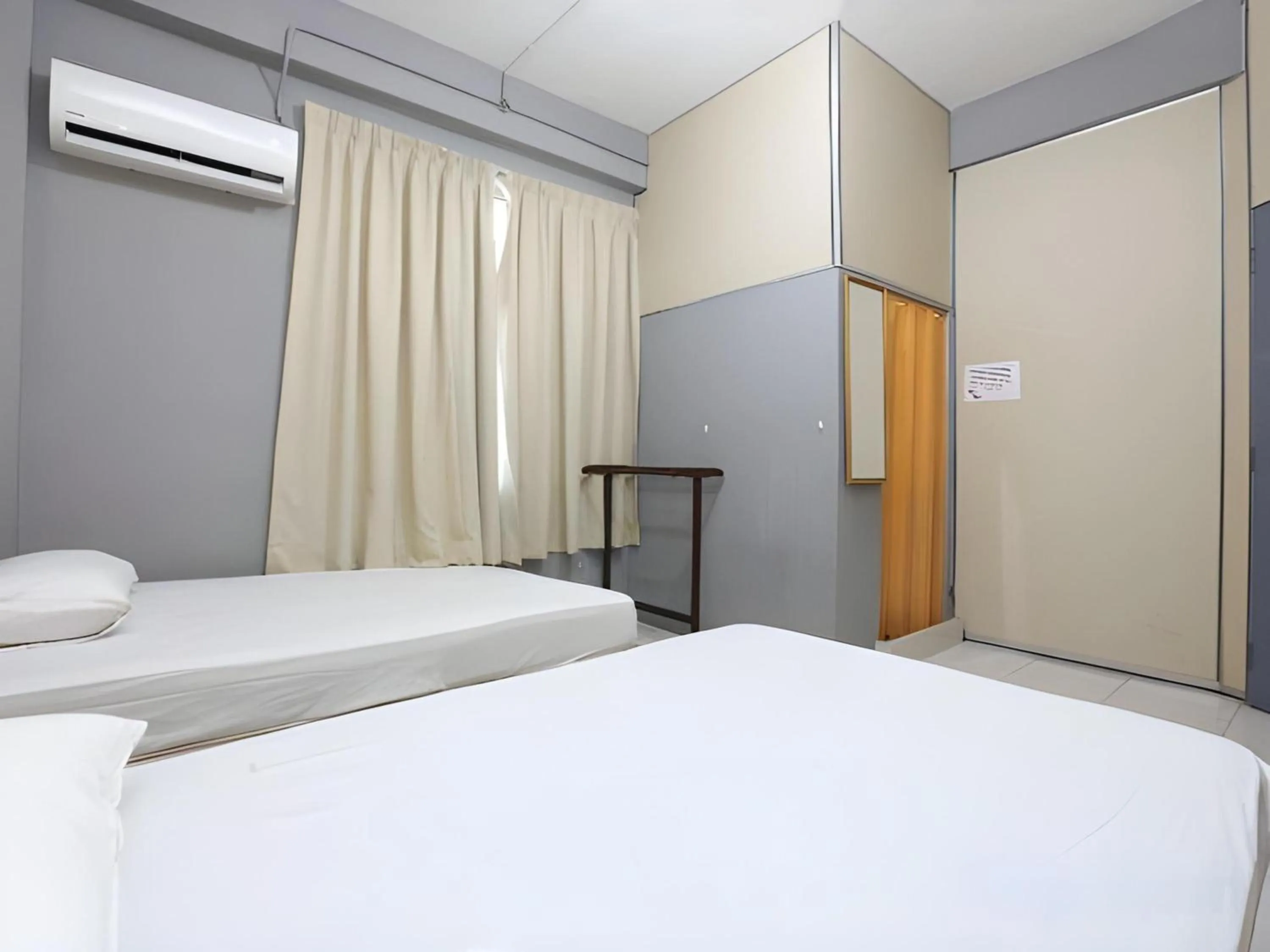 Photo of the whole room in SPOT ON 89796 D'noor Budget Inn